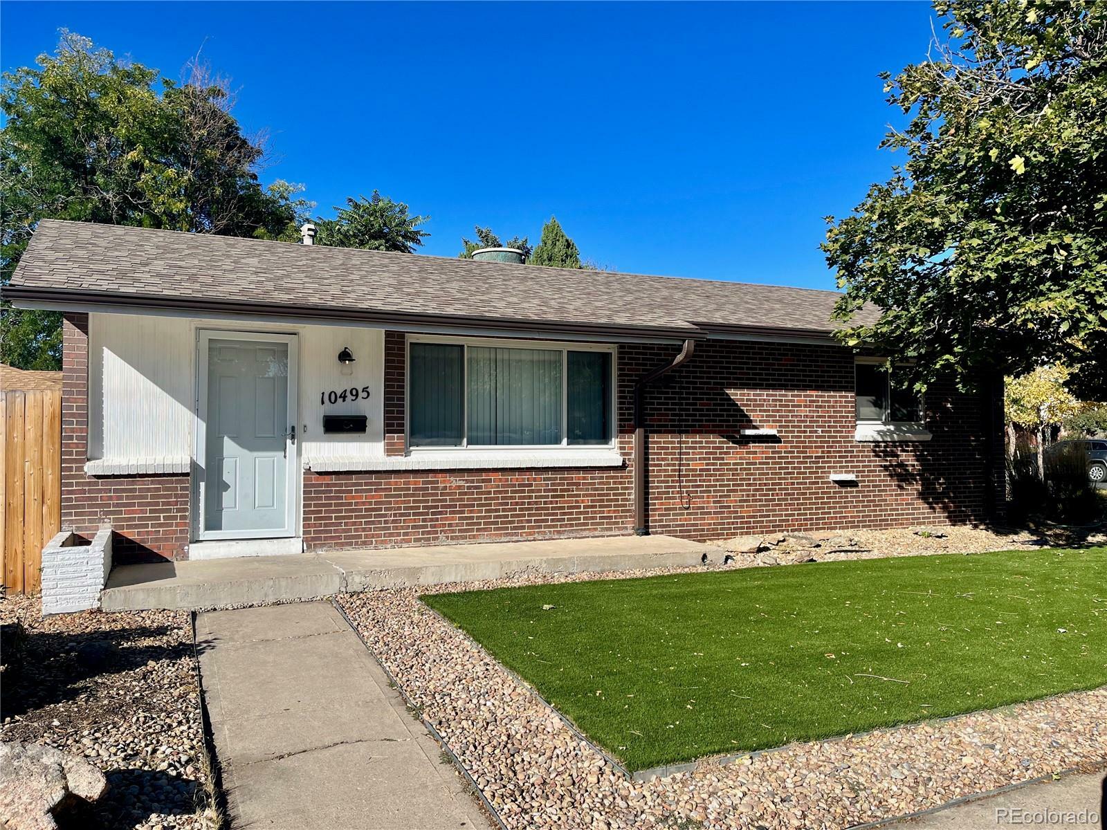 Property Photo:  10495 E 22nd Avenue  CO 80010 