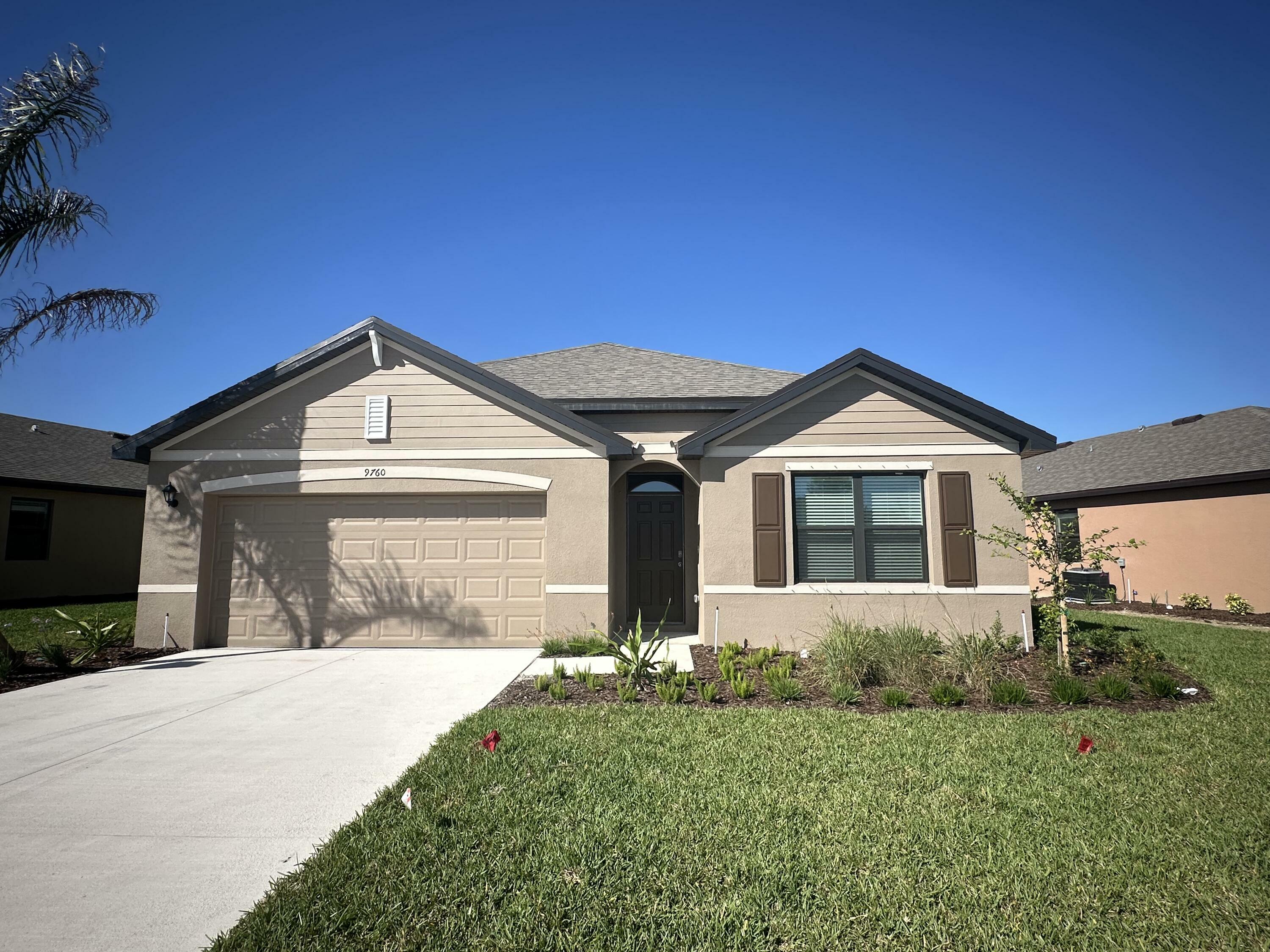 Property Photo: 9760 SW Triton Way FL 34987