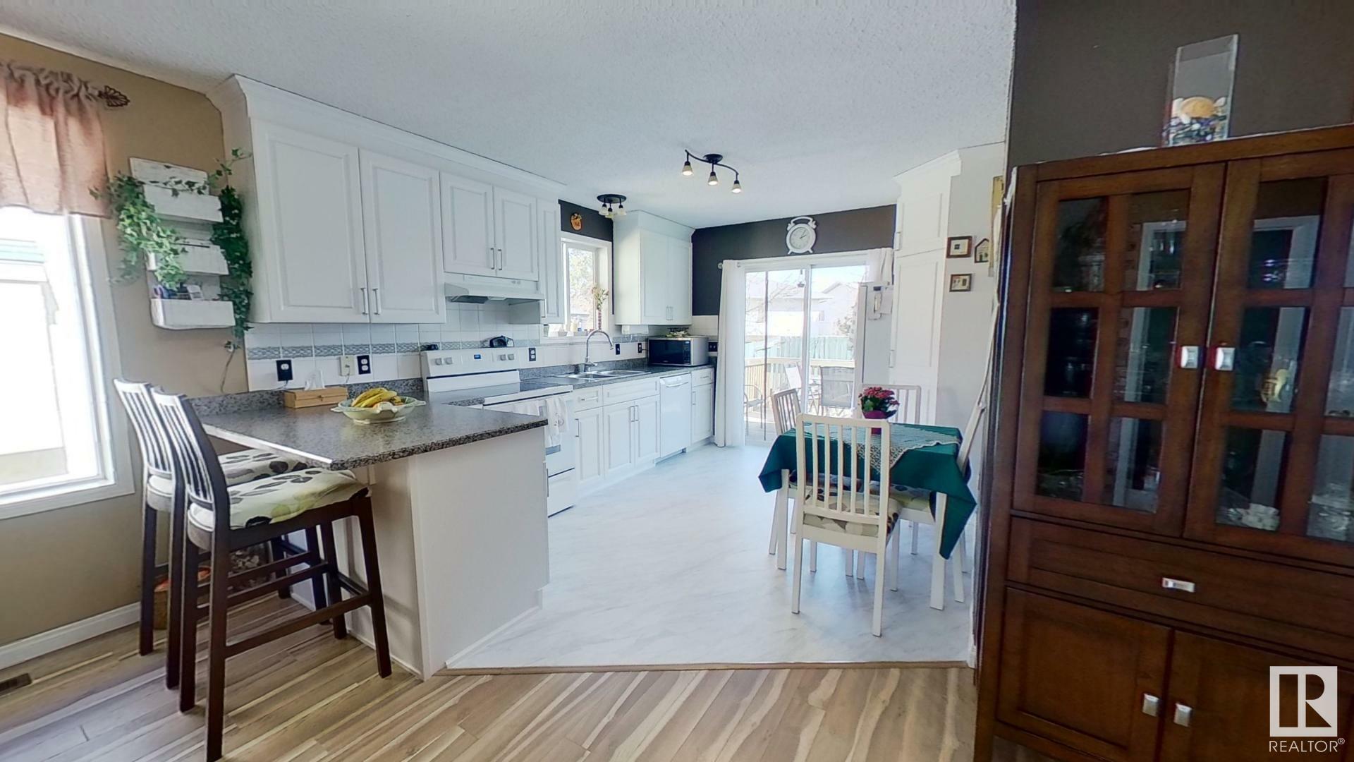 Property Photo:  135 Dunvegan Road NW  AB T5L 5A8 