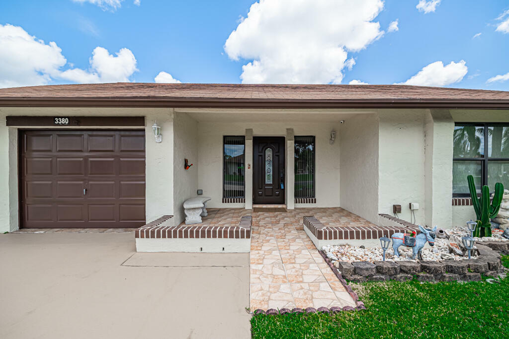 Property Photo:  3380 Shadow Wood Drive  FL 33463 