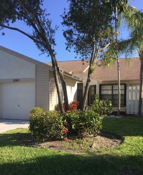 Property Photo:  12198 Forest Greens Drive  FL 33437 