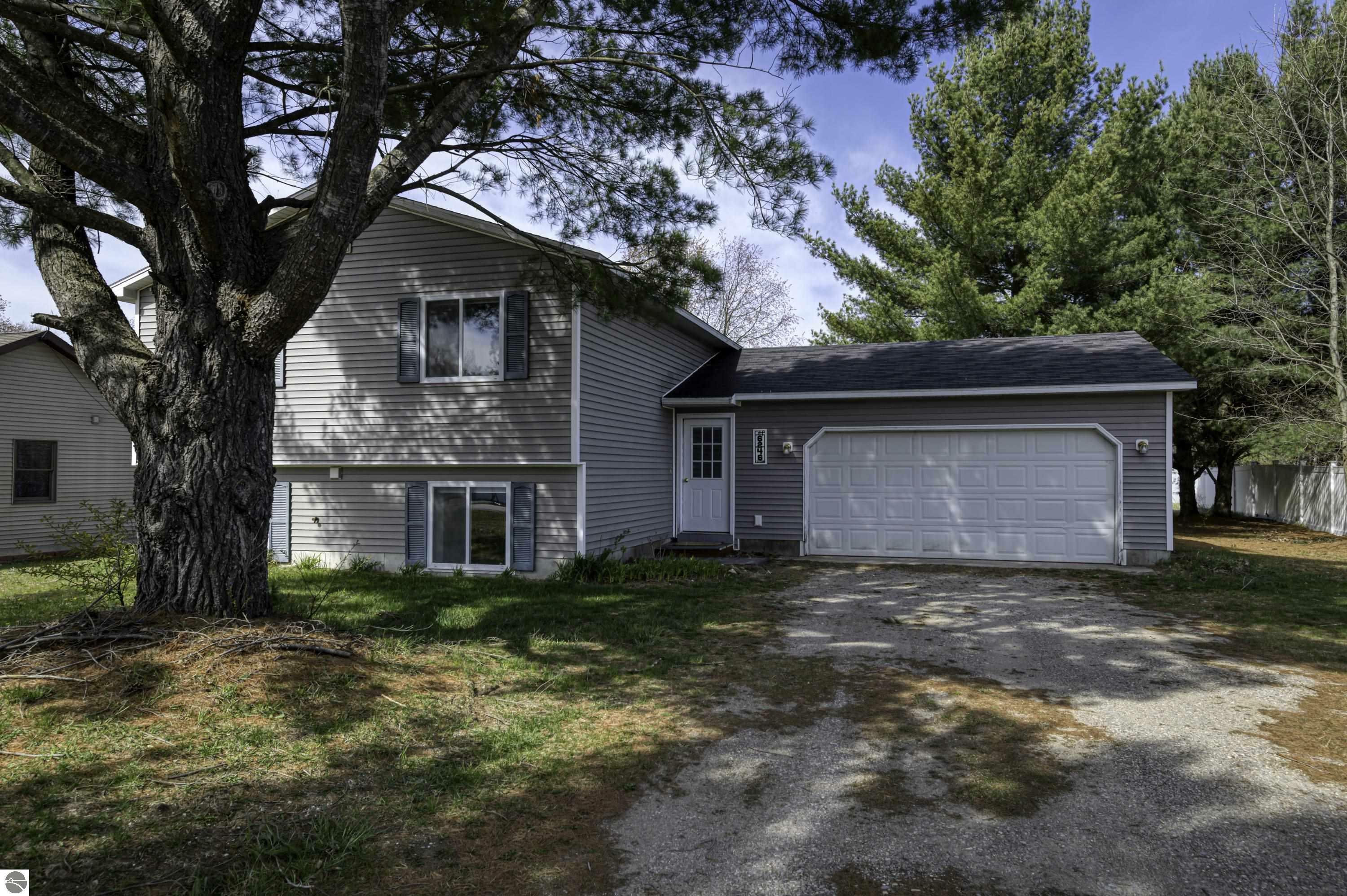 Property Photo:  6246 Sunset Drive  MI 49650 