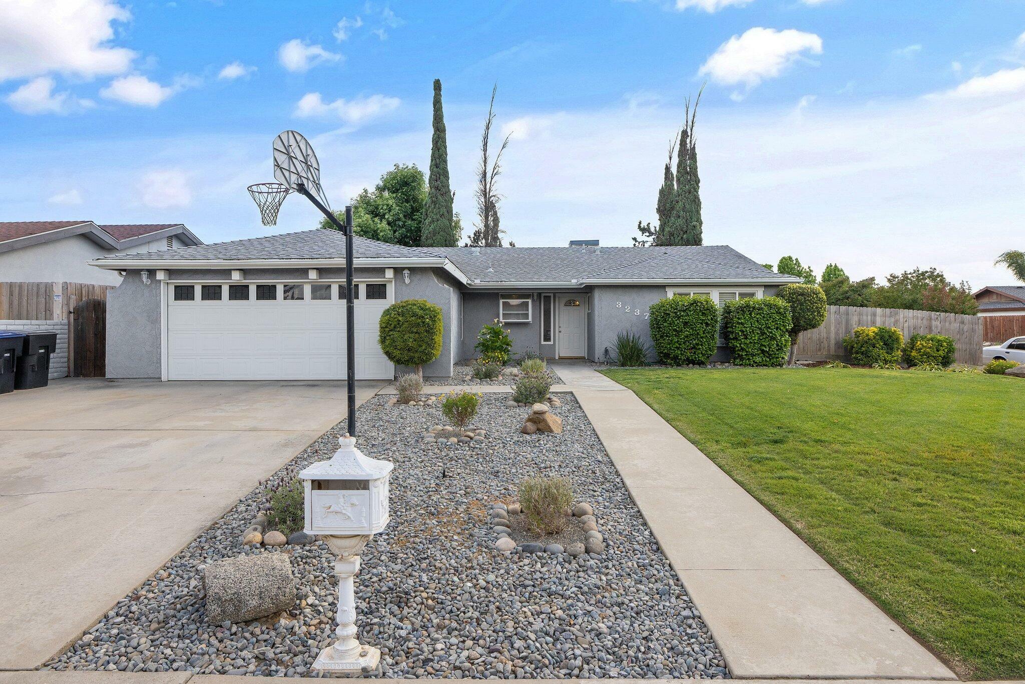 Property Photo:  3237 W Country Court  CA 93277 