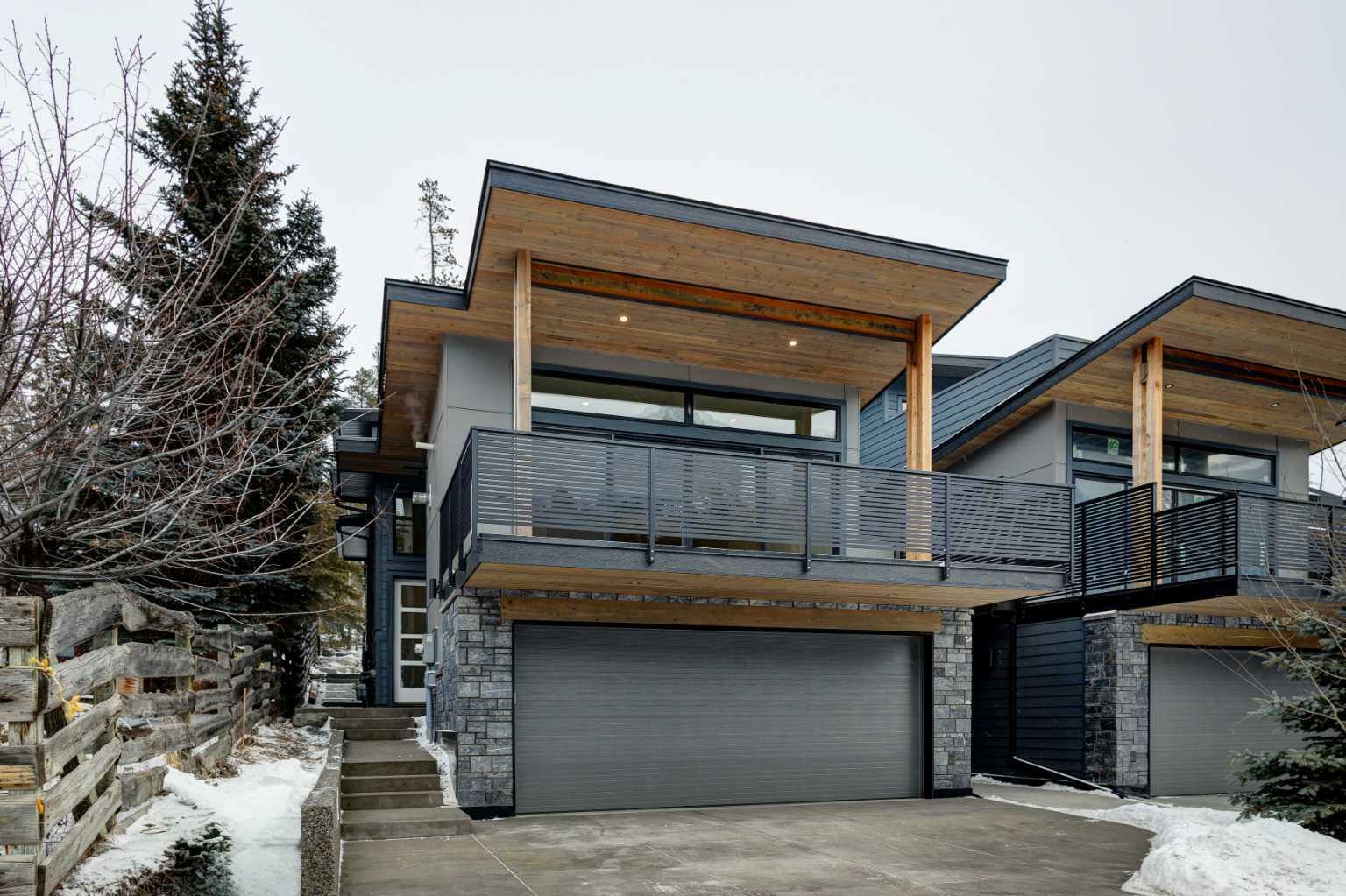 Property Photo: 274 C&D Three Sisters Drive AB T1W 2M7