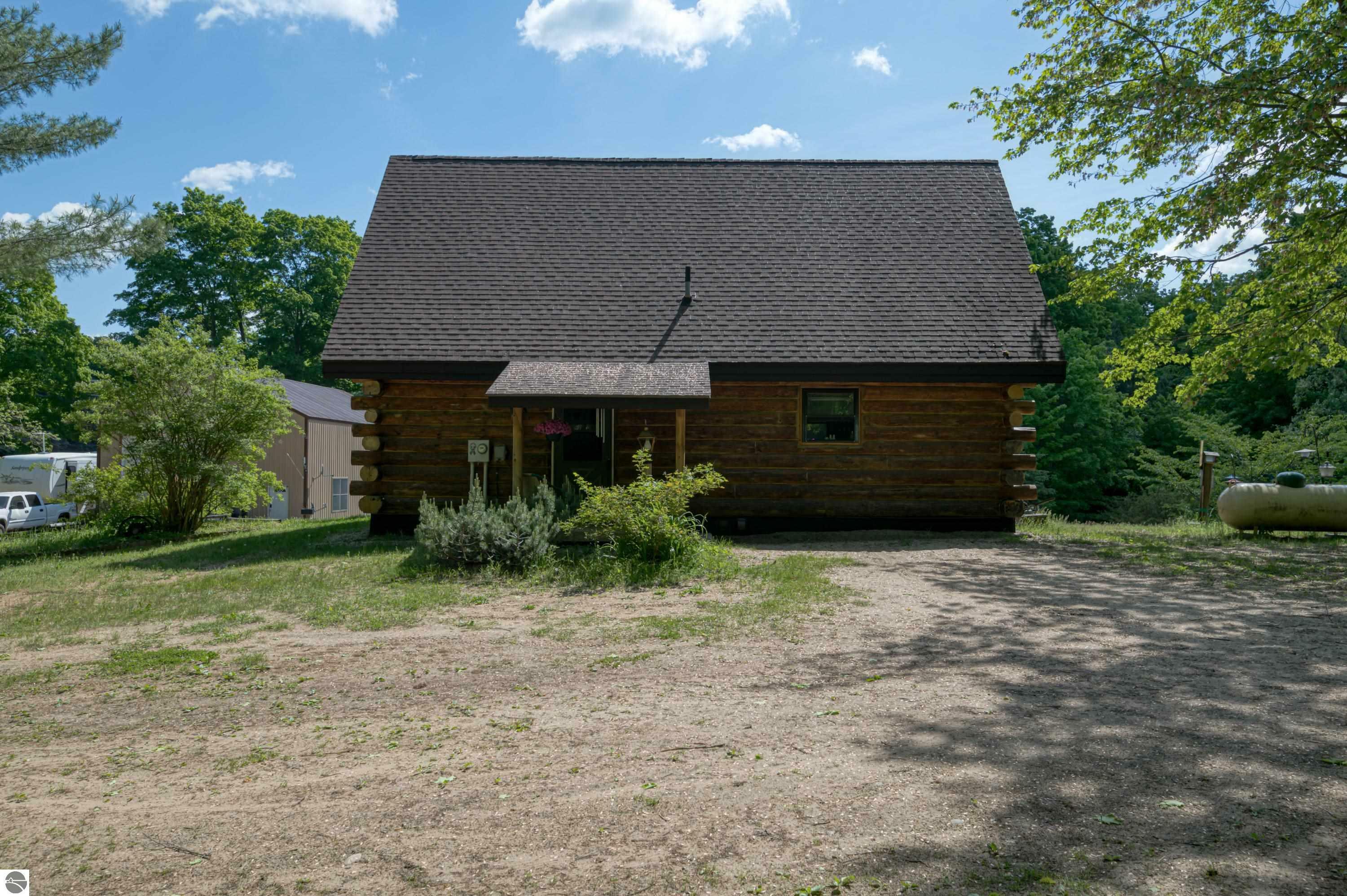 Property Photo:  264 SE W Sharon Road  MI 49633 