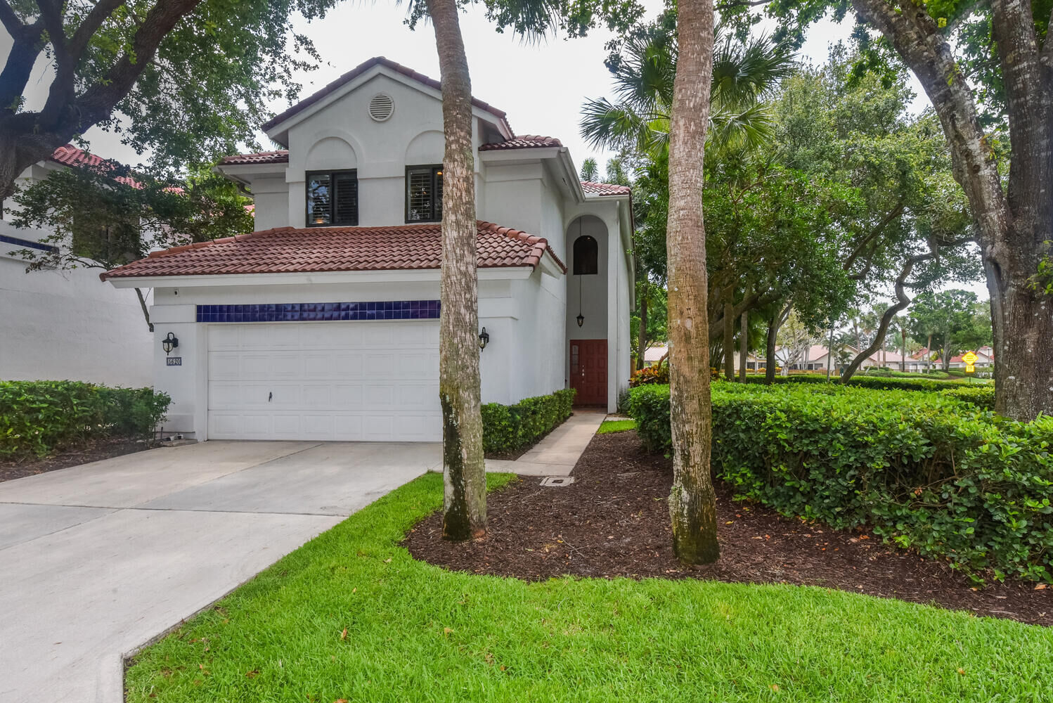 Property Photo: 5620 Amersham Way FL 33486