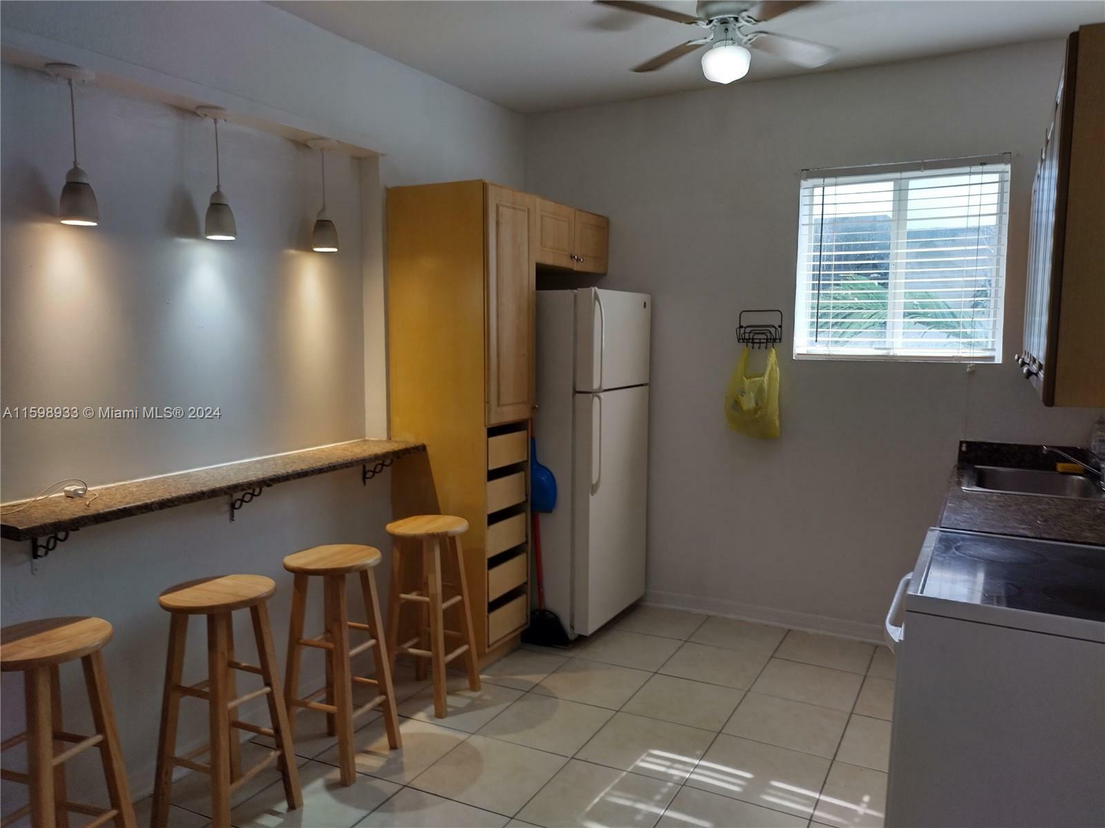 Property Photo:  1021 NW 3rd St 305  FL 33128 