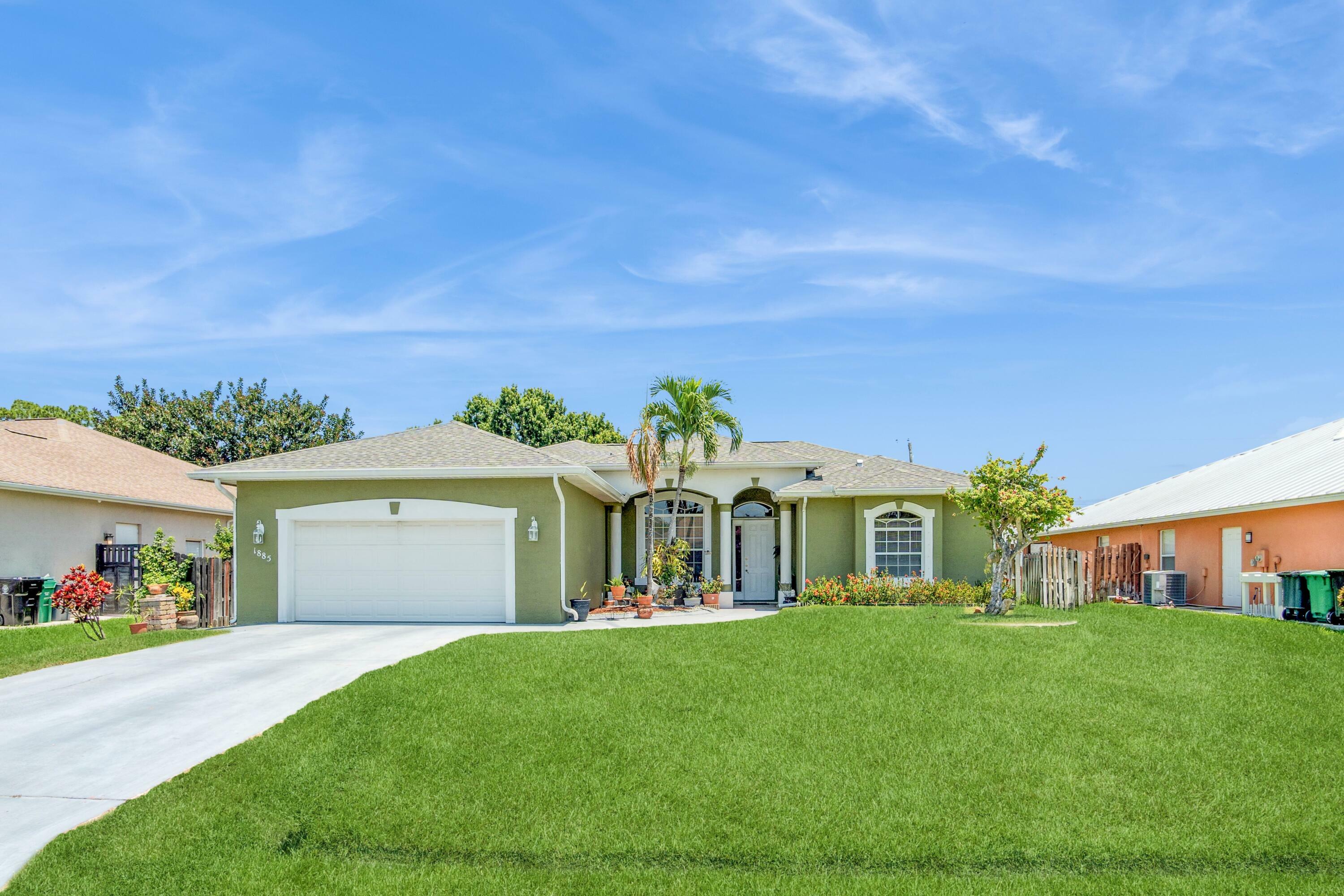 Property Photo:  1885 SW Altman Avenue  FL 34953 