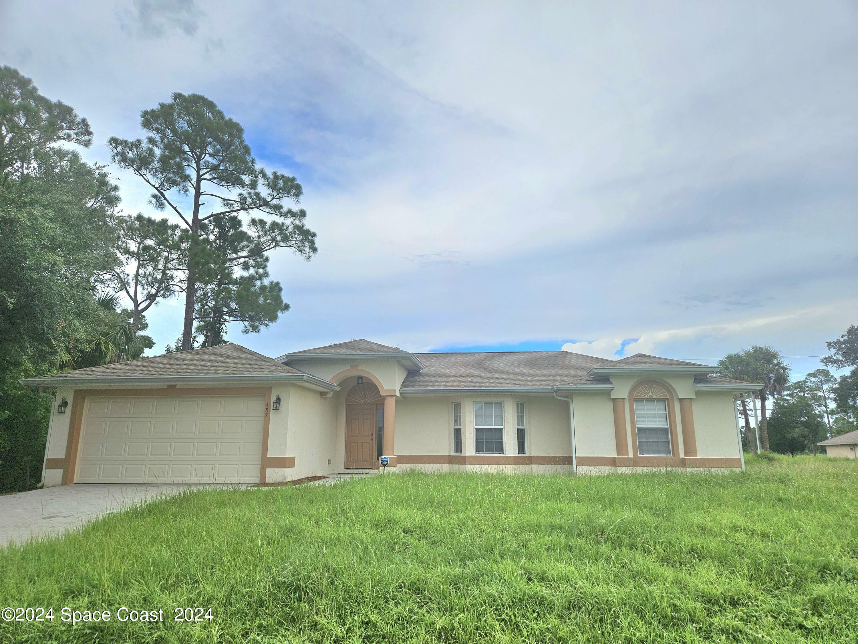 Property Photo:  587 Black Horse Street SE  FL 32909 