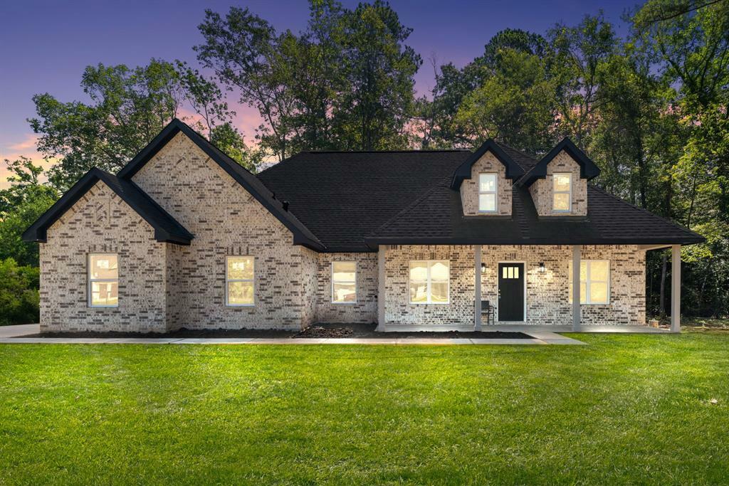 Property Photo: 120 County Road 3669B TX 77327