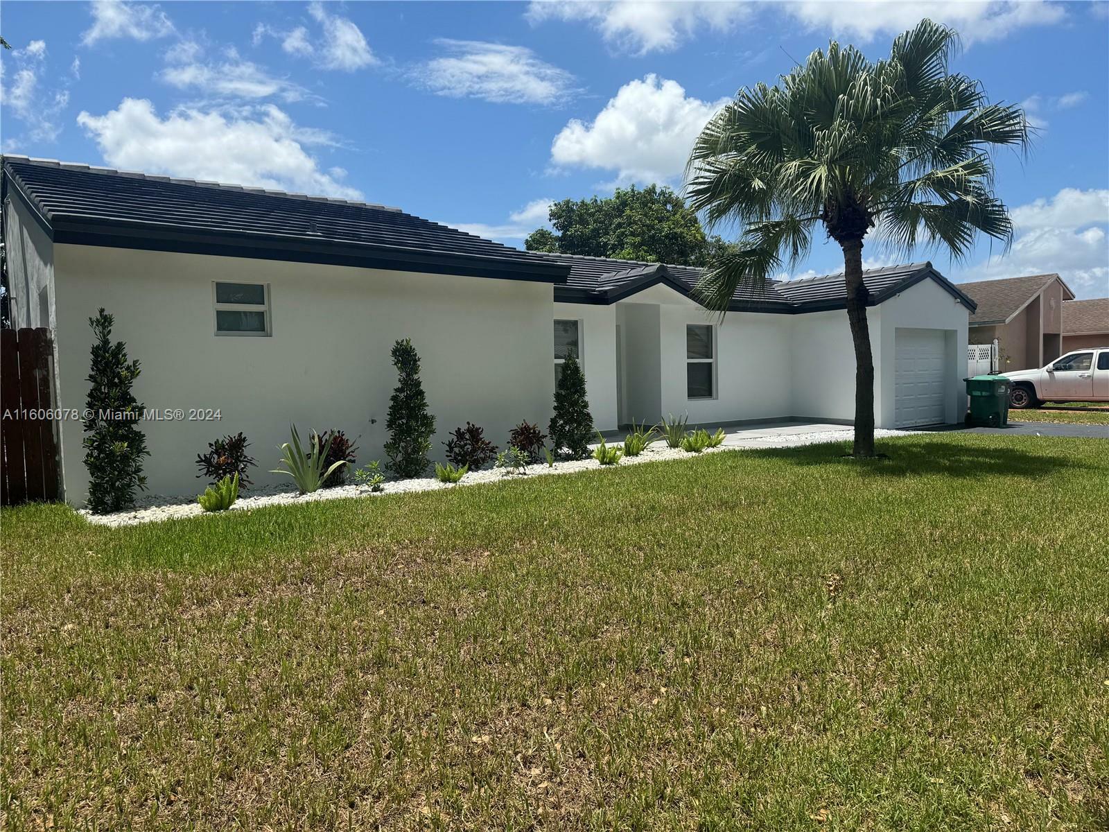 Property Photo:  19120 NW 57th Ct  FL 33015 