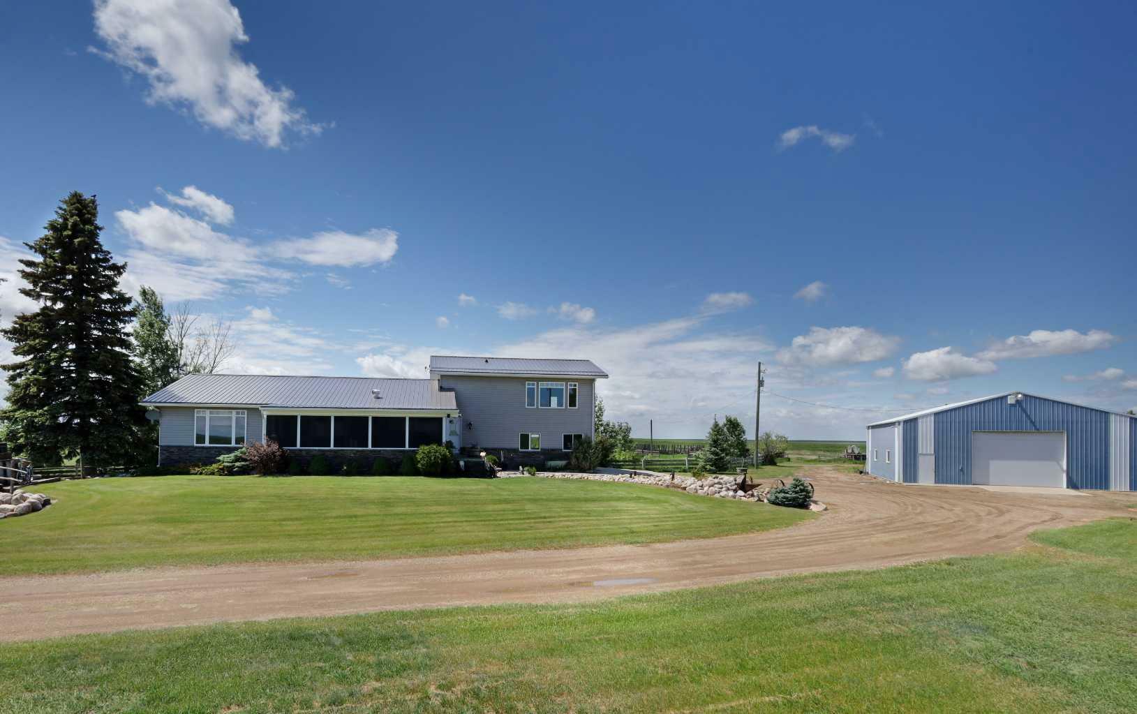 Property Photo:  182048 Rge Rd 163  AB T1R 1B2 