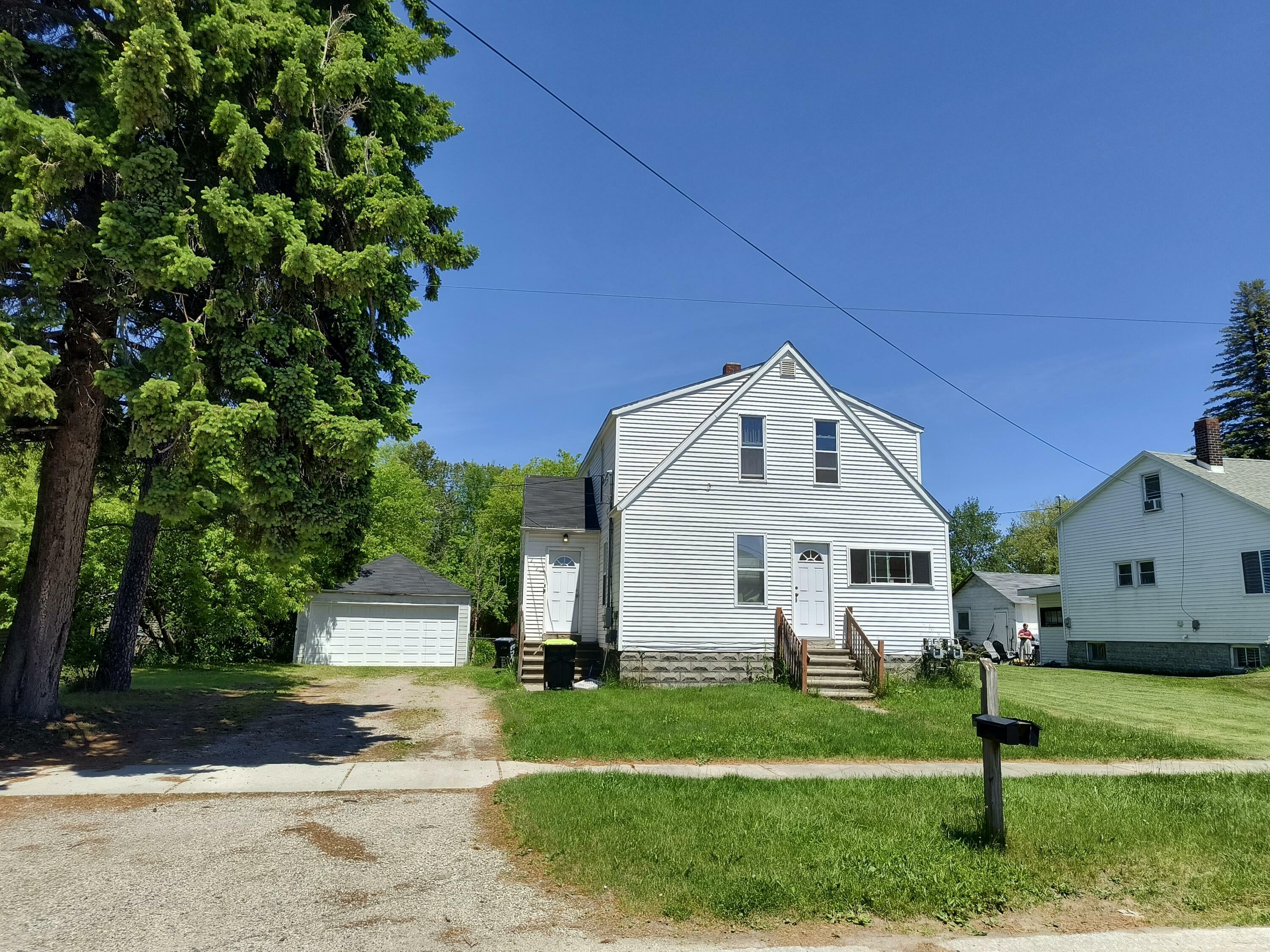 Property Photo:  212 E Palm Street  MI 49707 