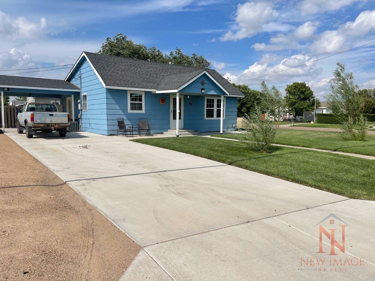 Property Photo:  701 West Maple Street  KS 67846 