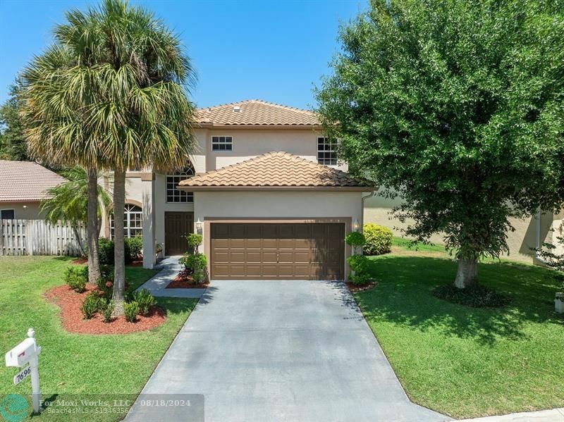 Property Photo:  7696 Northtree Way  FL 33467 