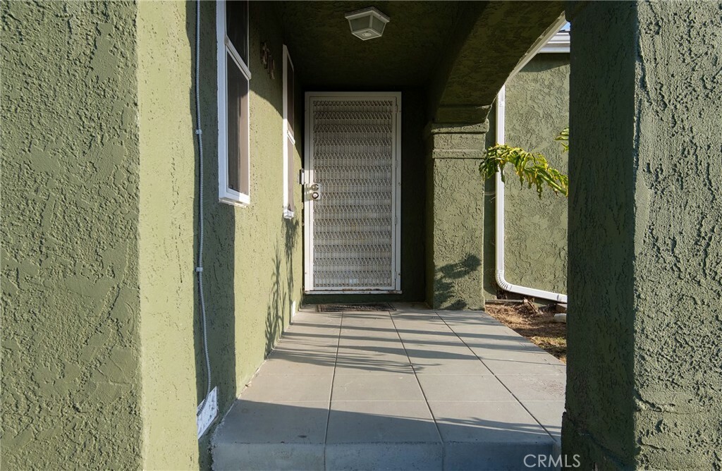 Property Photo:  8710 Cimarron Street  CA 90047 