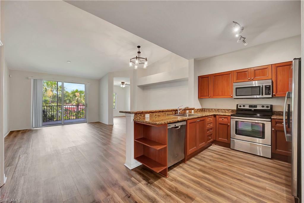 Property Photo:  10110 Villagio Palms Way 203  FL 33928 