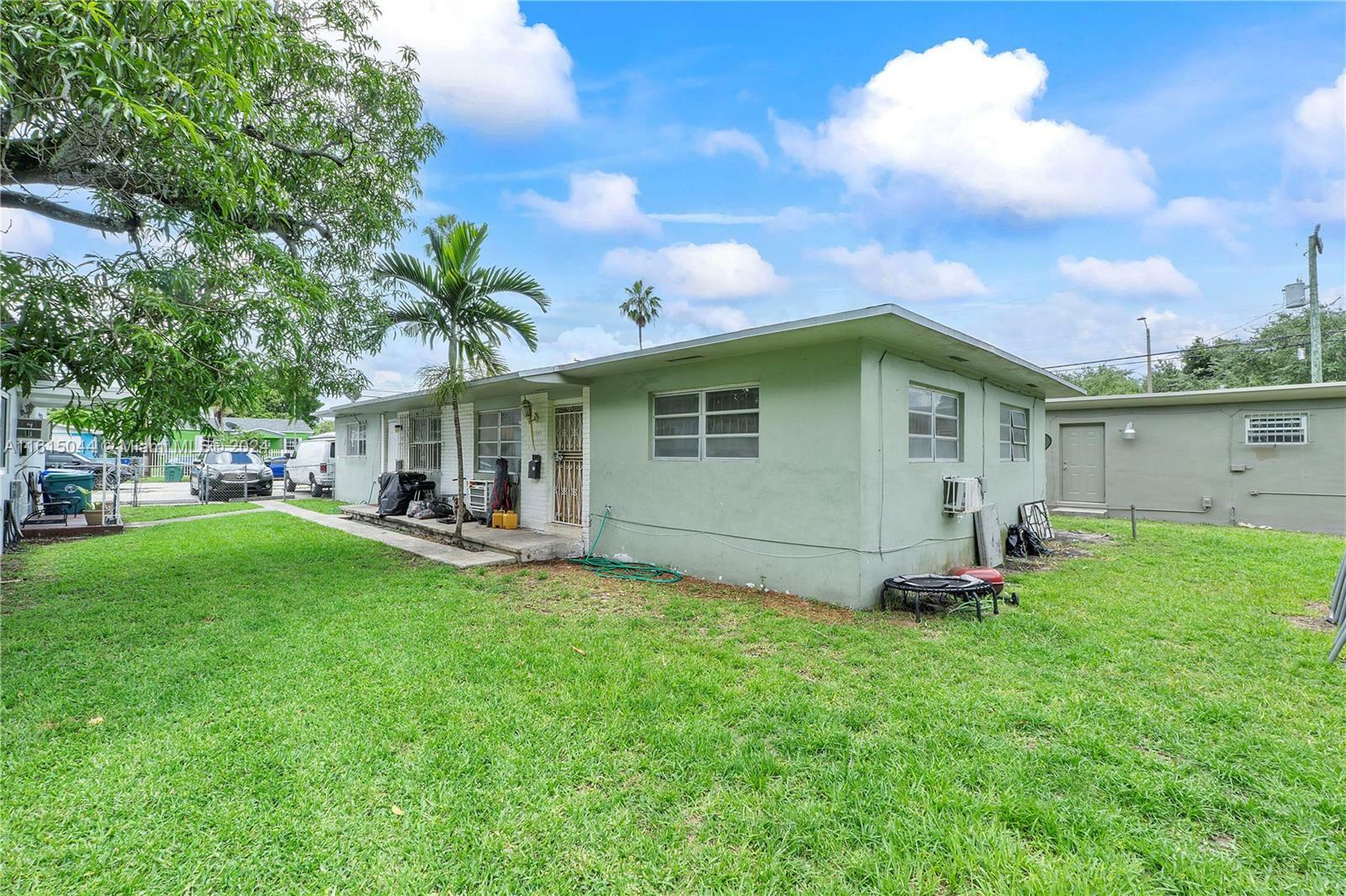 Property Photo:  1539 NW 45th St  FL 33142 