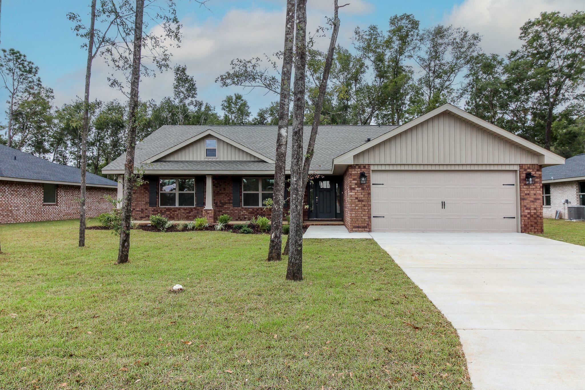 Property Photo:  5832 Crestlake Drive  FL 32536 