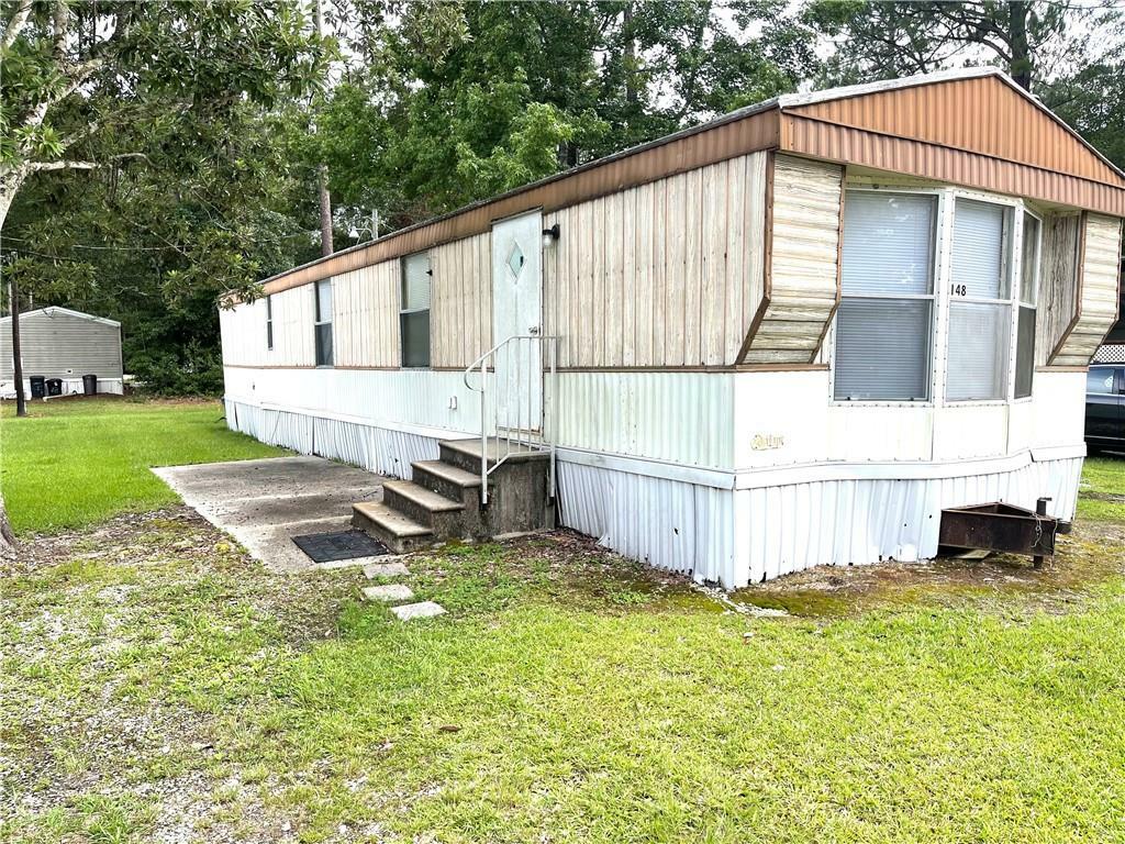 Property Photo:  64096 Mangano Road 148  LA 70452 