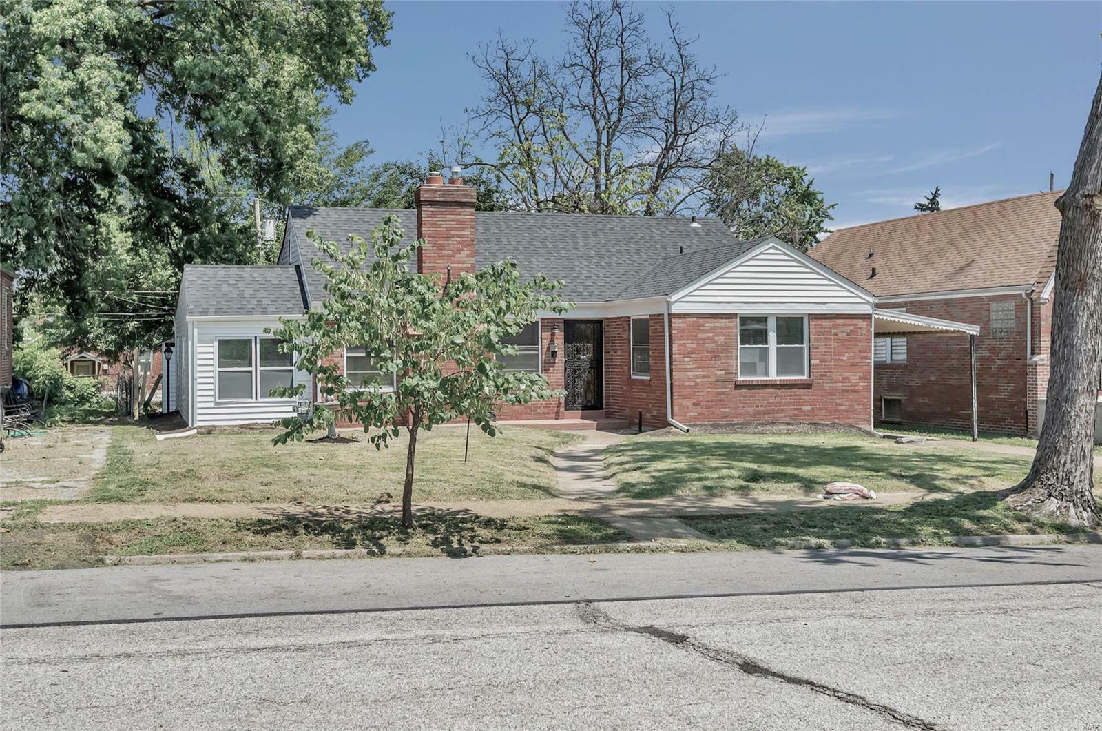 Property Photo:  6815 Julian Avenue  MO 63130 