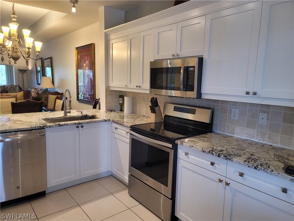 Property Photo:  7839 Regal Heron Circle 303  FL 34104 