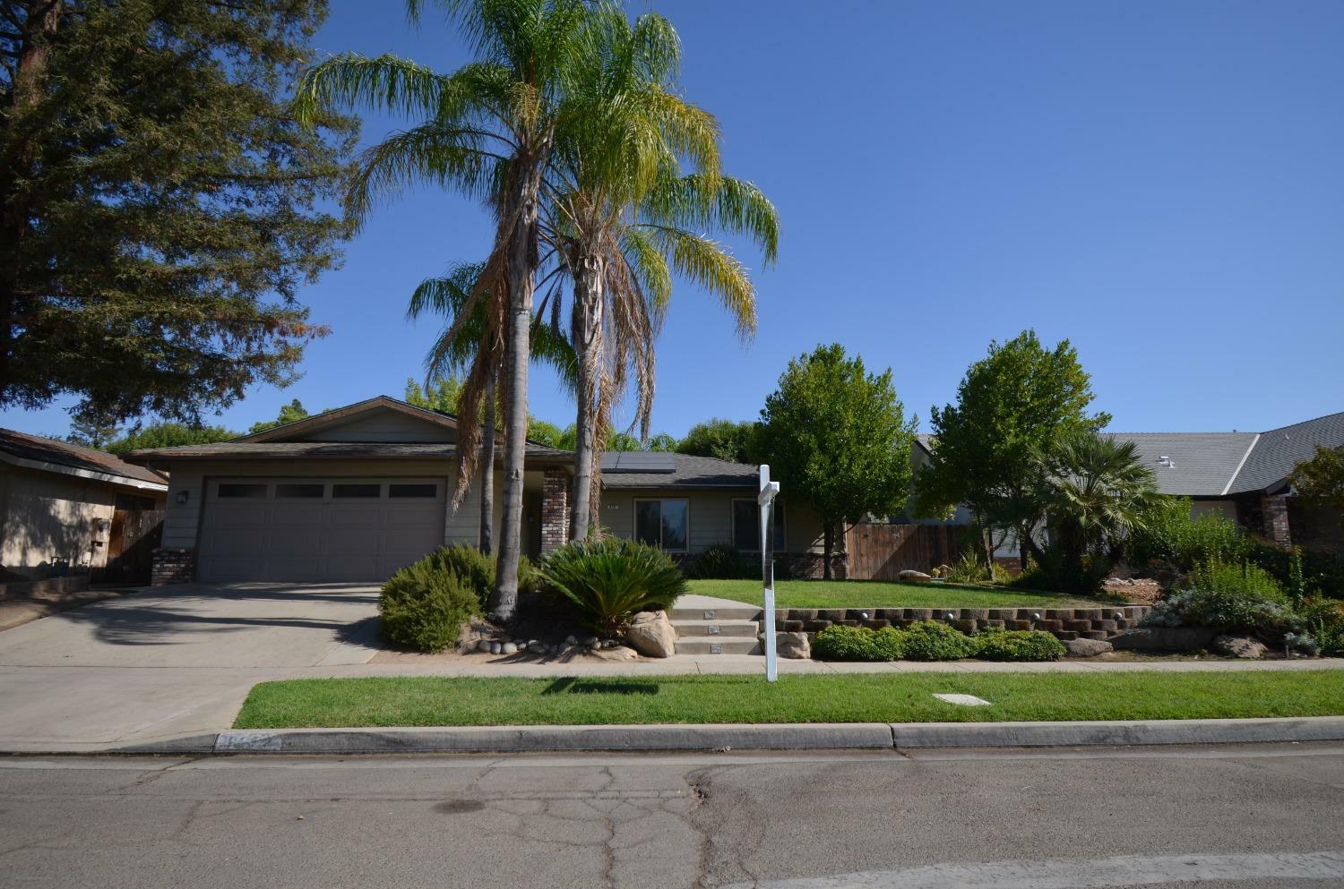 Property Photo:  8292 N Poplar Avenue  CA 93711 