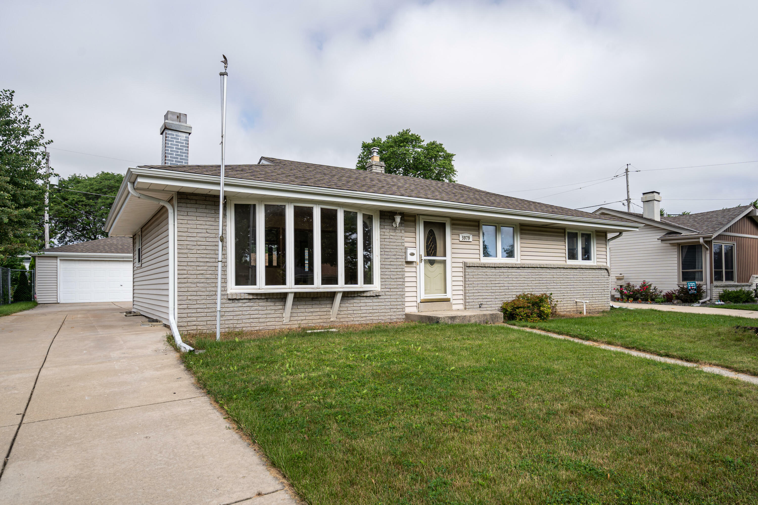 Property Photo:  5979 S Indiana Ave  WI 53110 