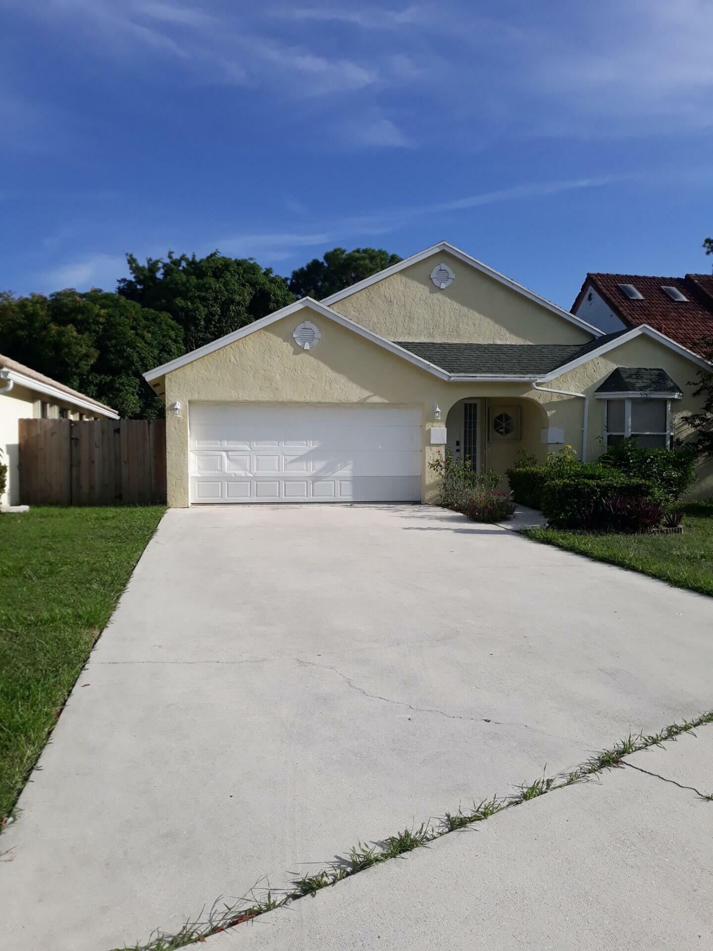 Property Photo:  5080 Foxhall Drive S  FL 33417 