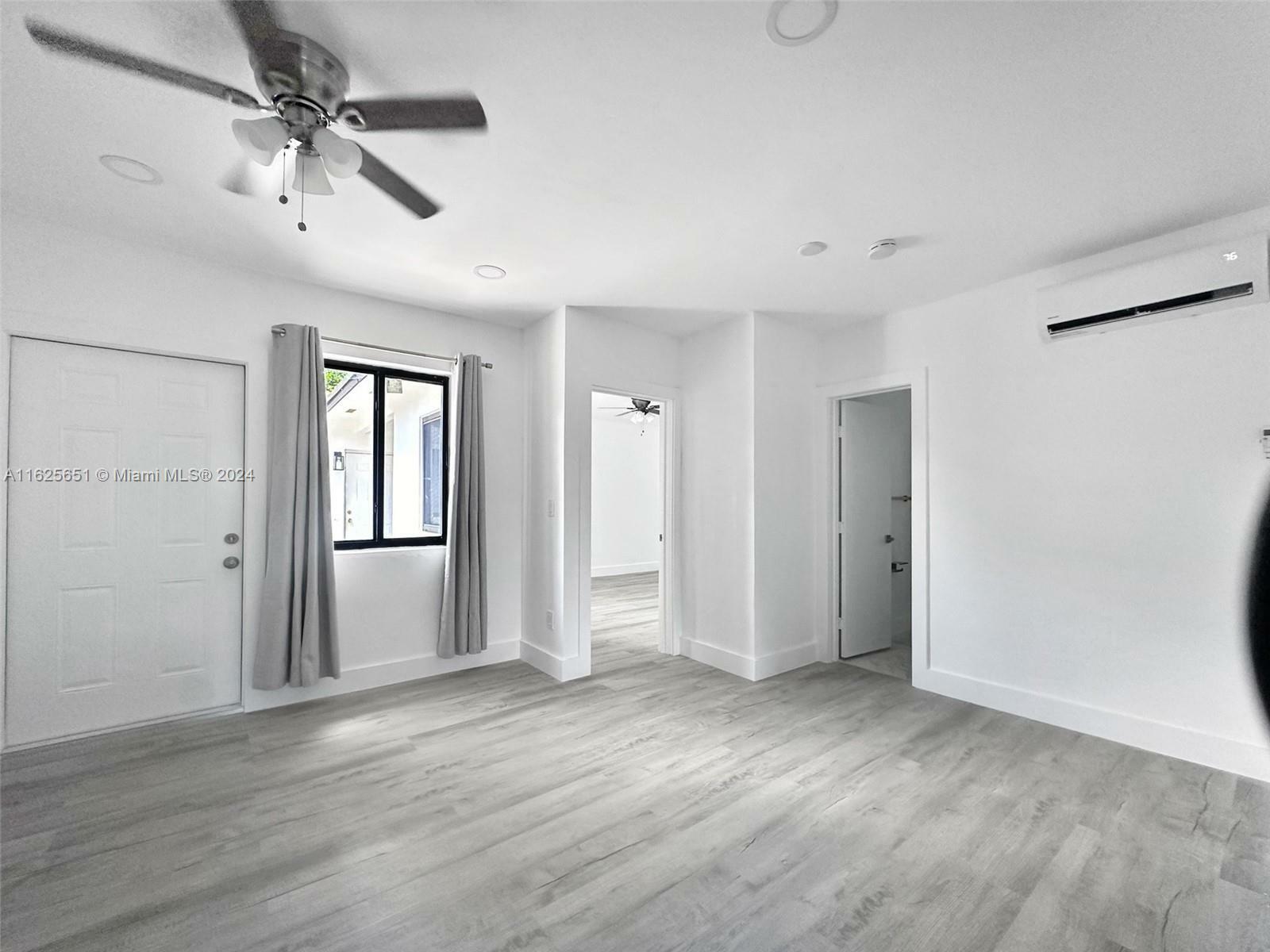 Property Photo:  1477 NE 116th St A  FL 33161 