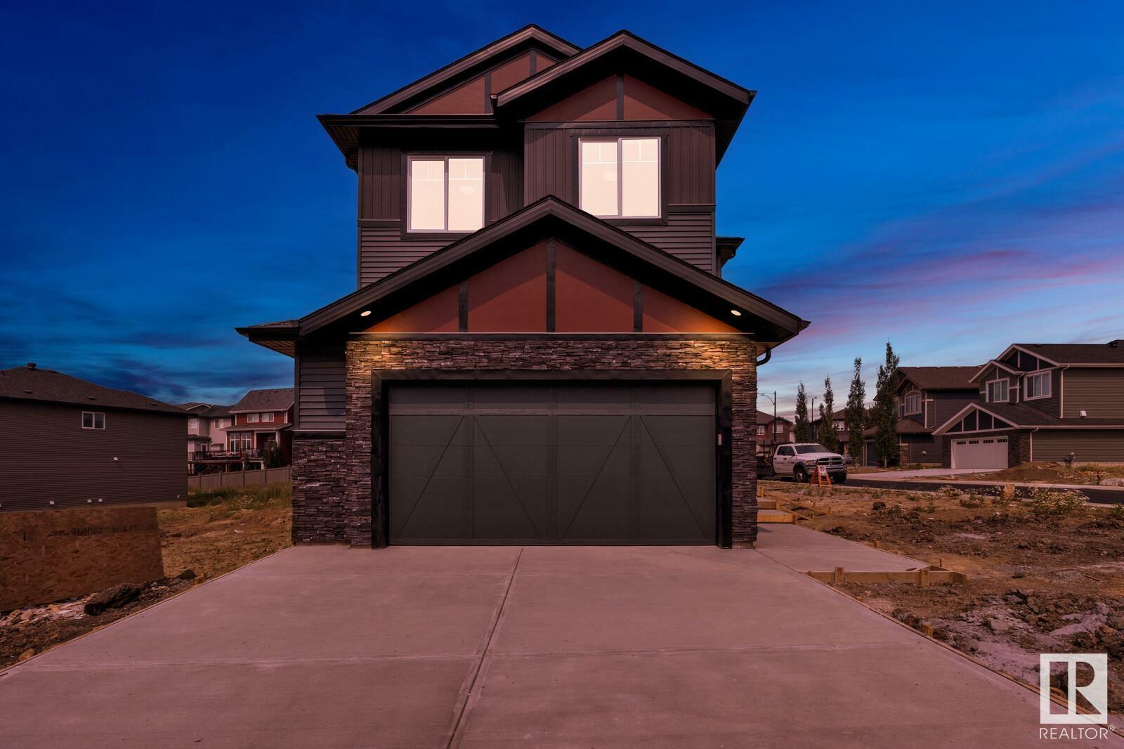 Property Photo:  1138 Gyrfalcon Crescent NW  AB T5S 0H7 