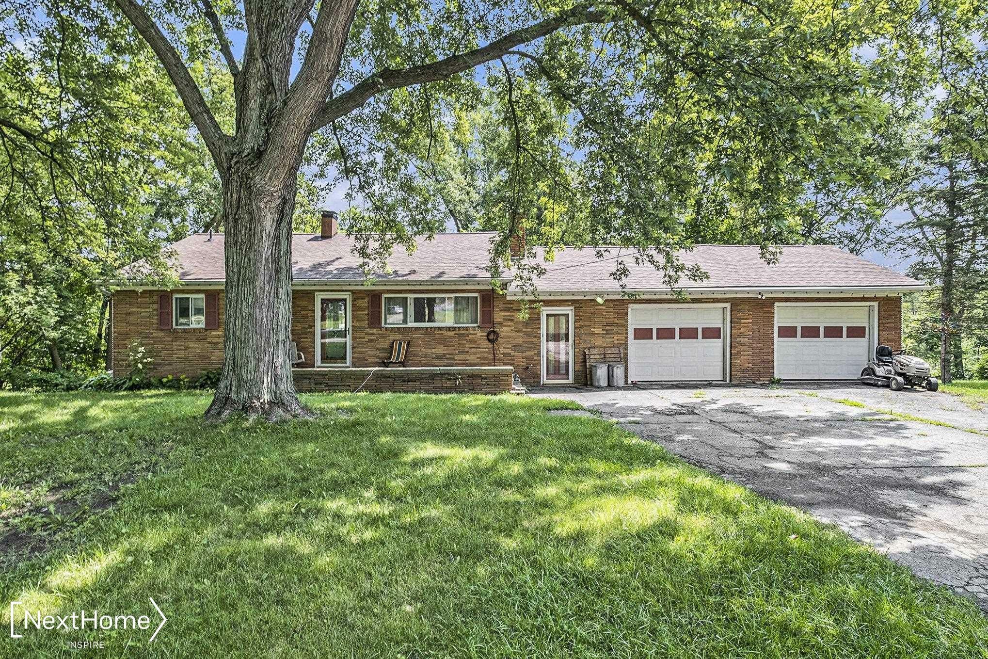 Property Photo:  5052 N Seymour Road  MI 48433-1065 