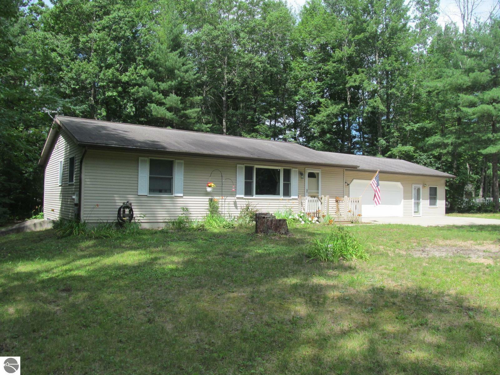 Property Photo:  7386 Hickory Court  MI 49601-8693 