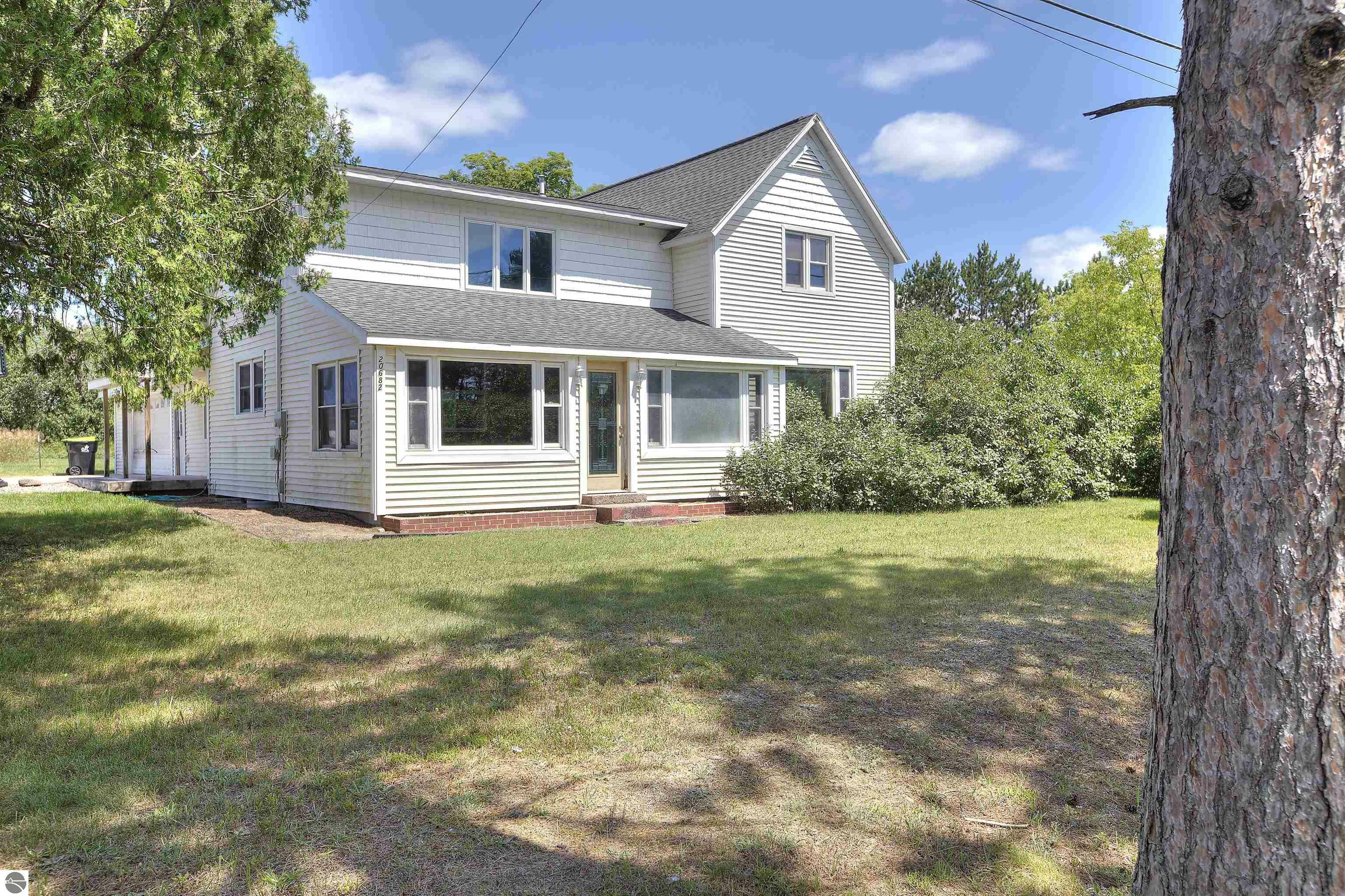 Property Photo:  20682 Honor Highway  MI 49653 