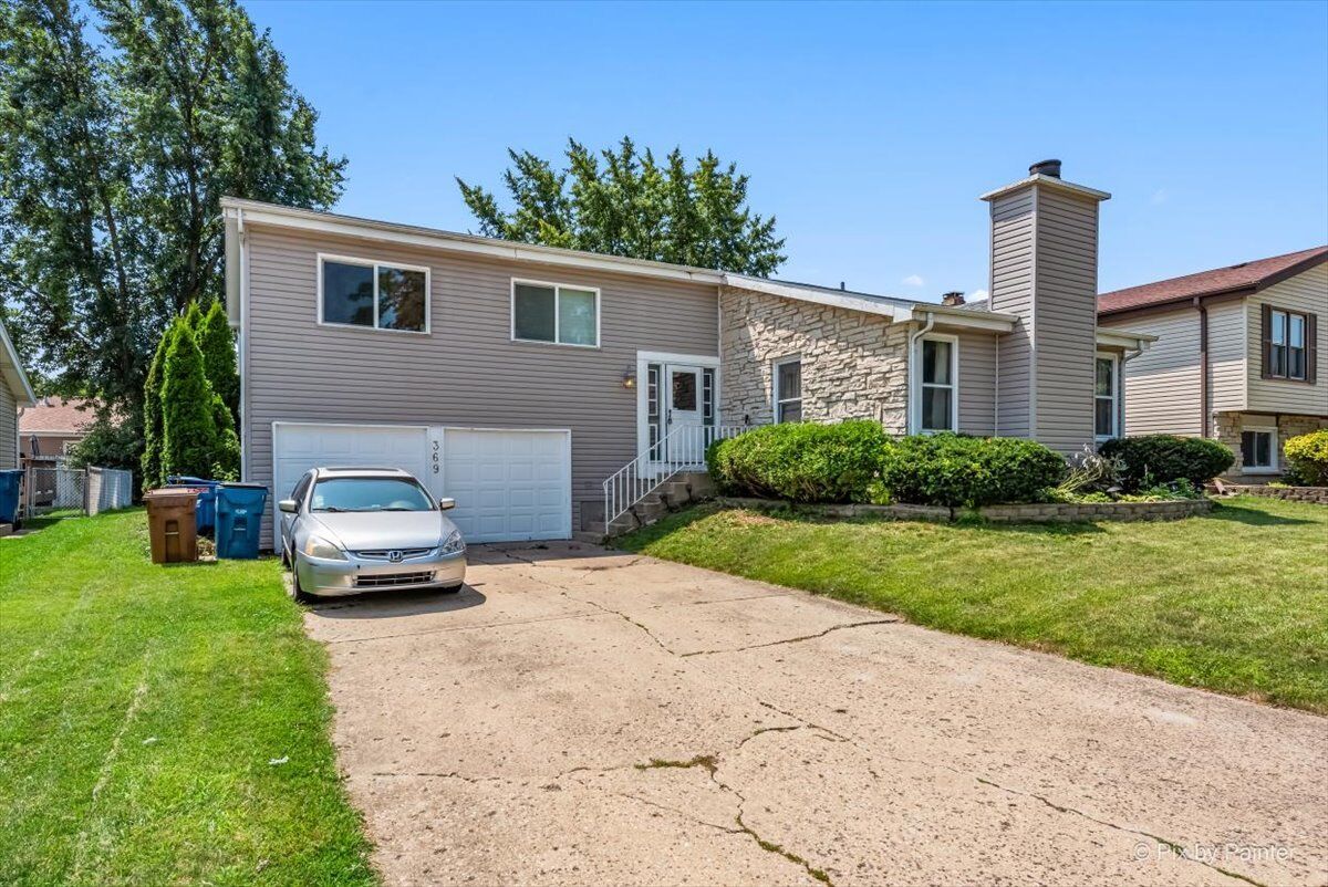 Property Photo: 369 Loveland Drive IL 60139