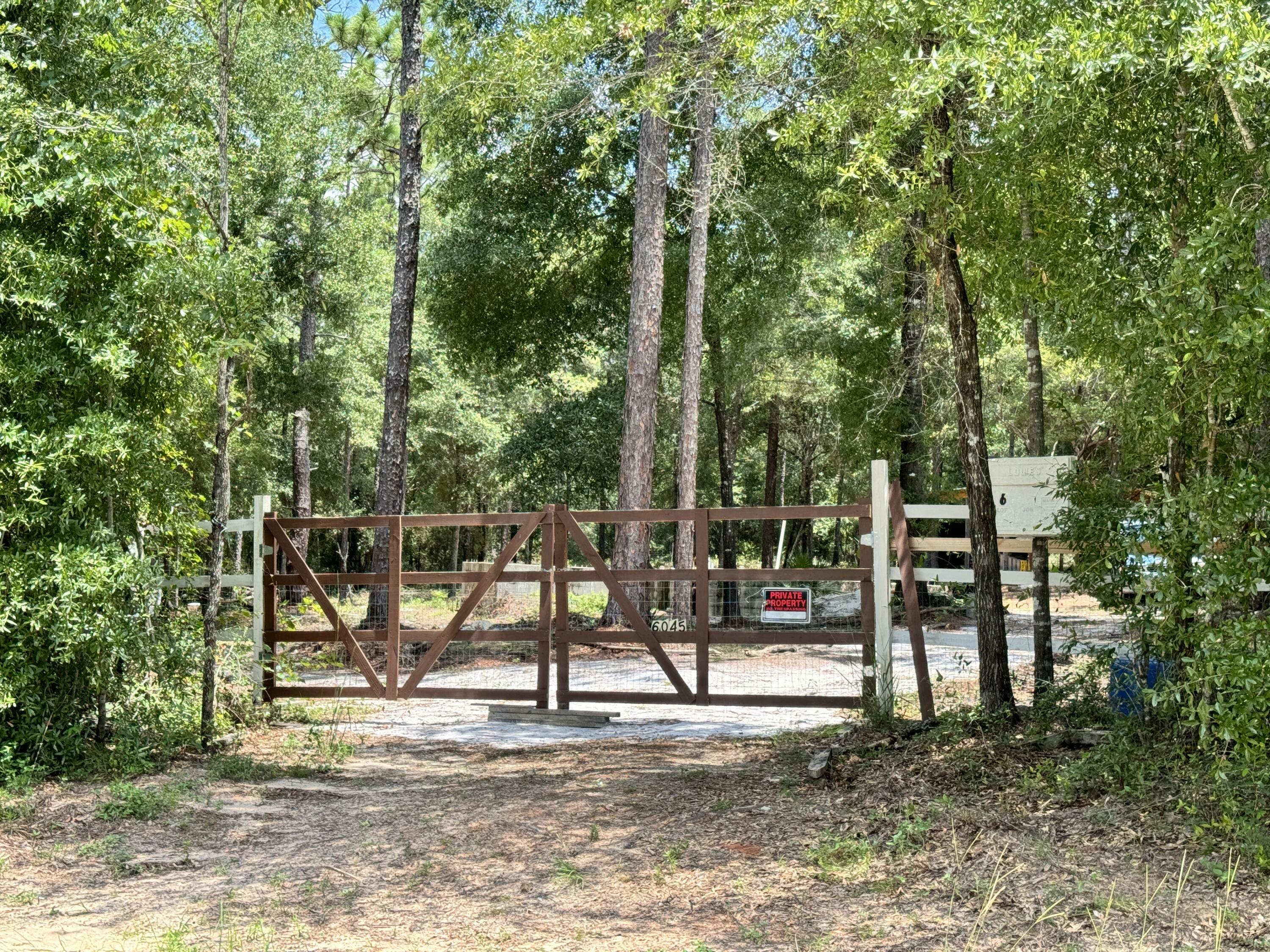 Property Photo:  6045 Sand Hill Road  FL 32539 