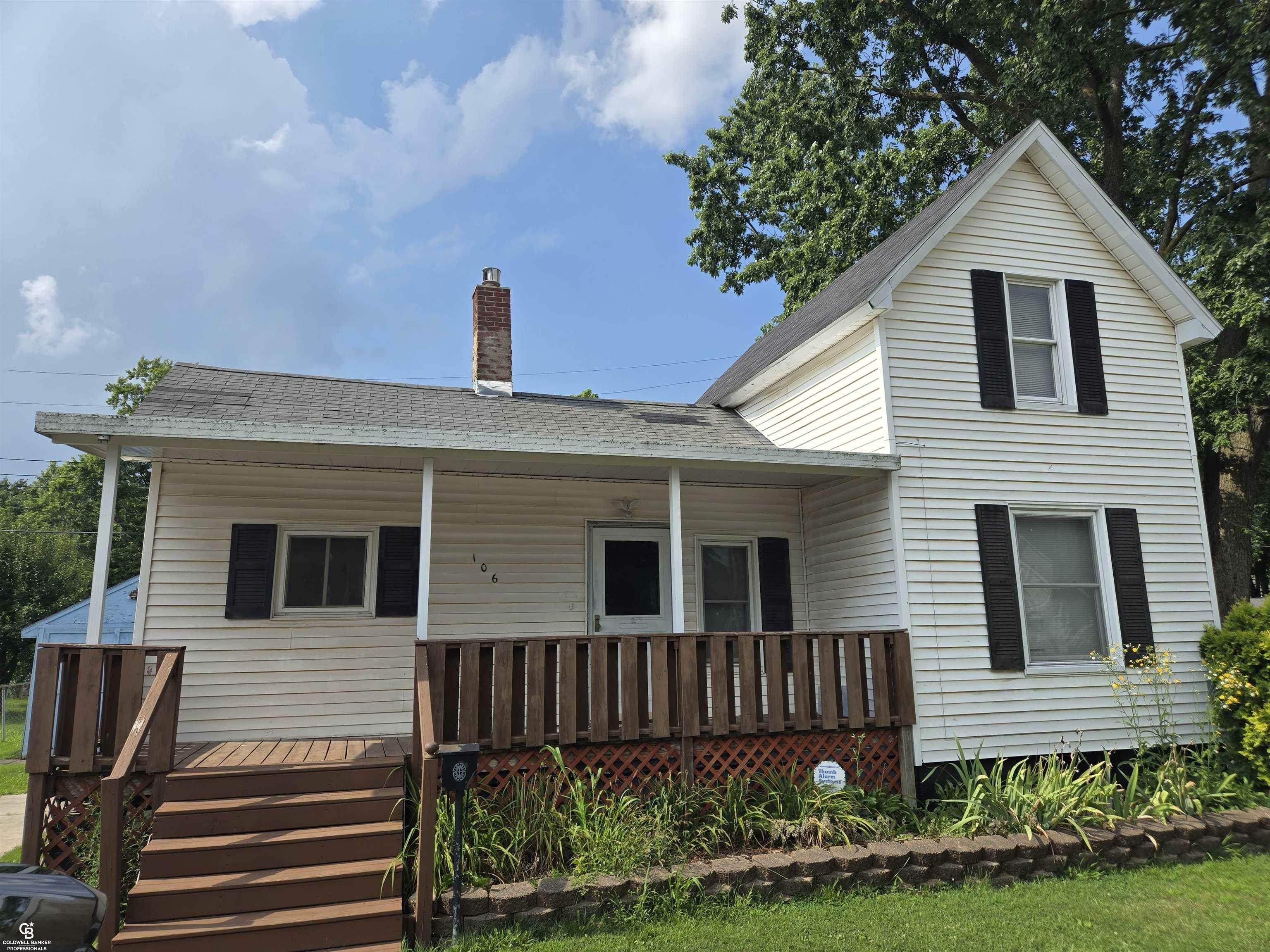 Property Photo:  106 Pope Street  MI 48446 