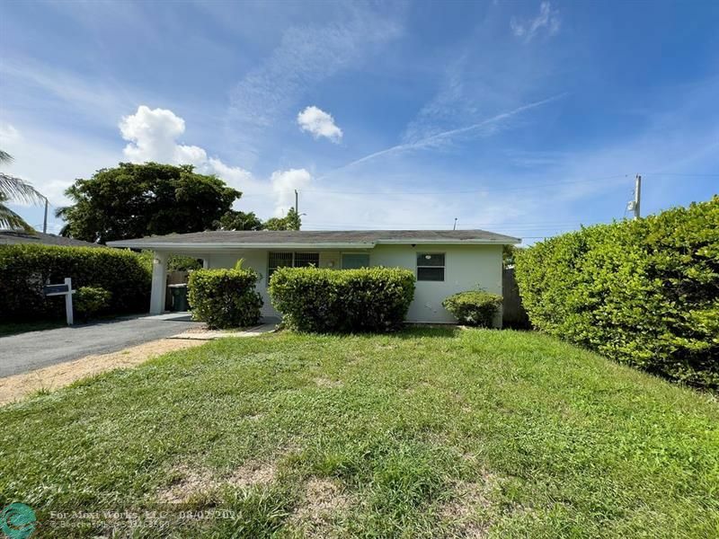 Property Photo:  331 NE 49th St  FL 33334 