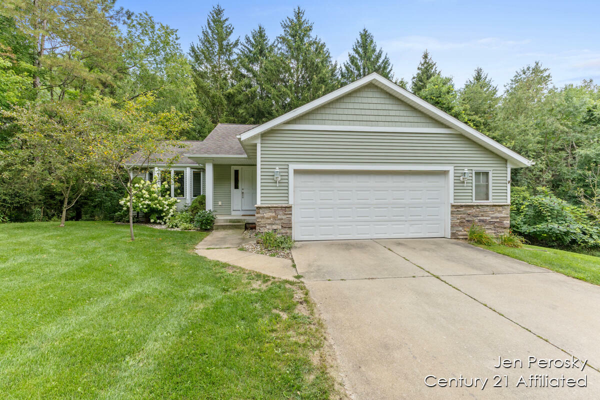 Property Photo:  8300 Bush Drive NE  MI 49341 