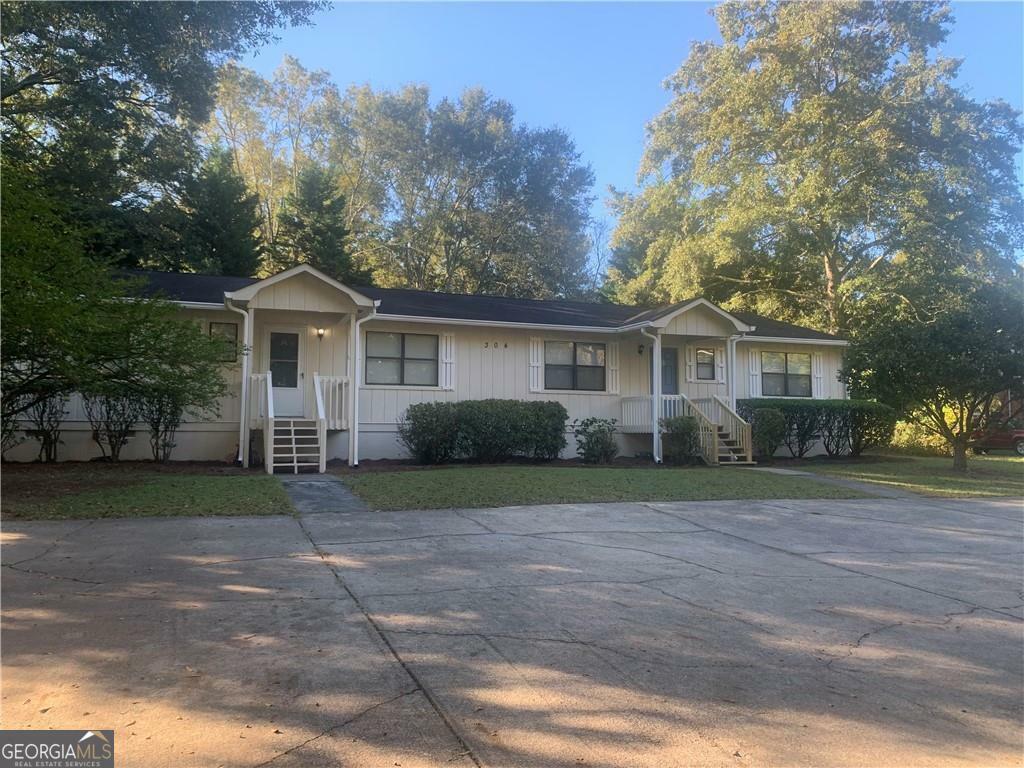 Property Photo:  304 Powder Springs Street  GA 30141 