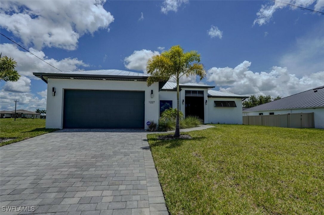 Property Photo: 1227 NW 40th Place FL 33993
