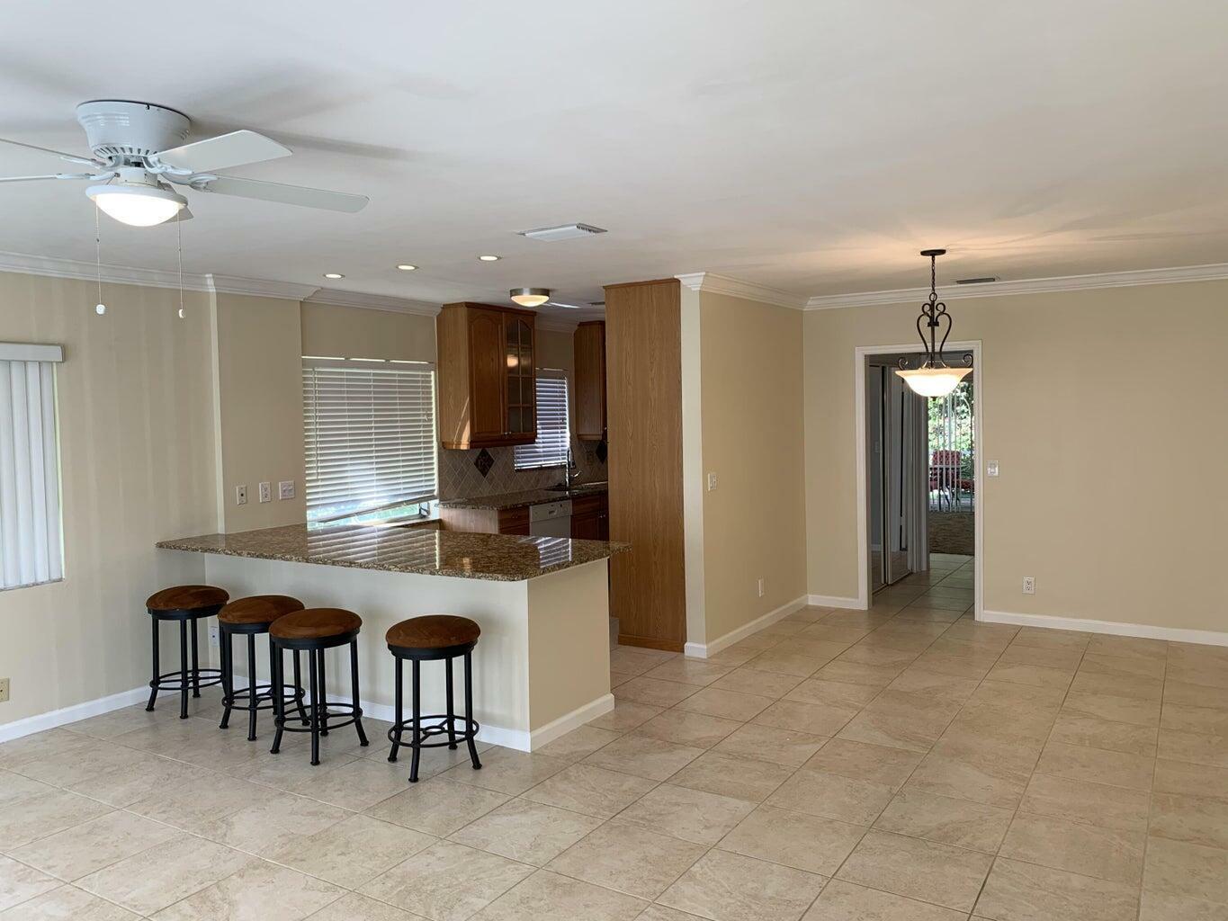 Property Photo:  6551 NE 7th Avenue A  FL 33487 