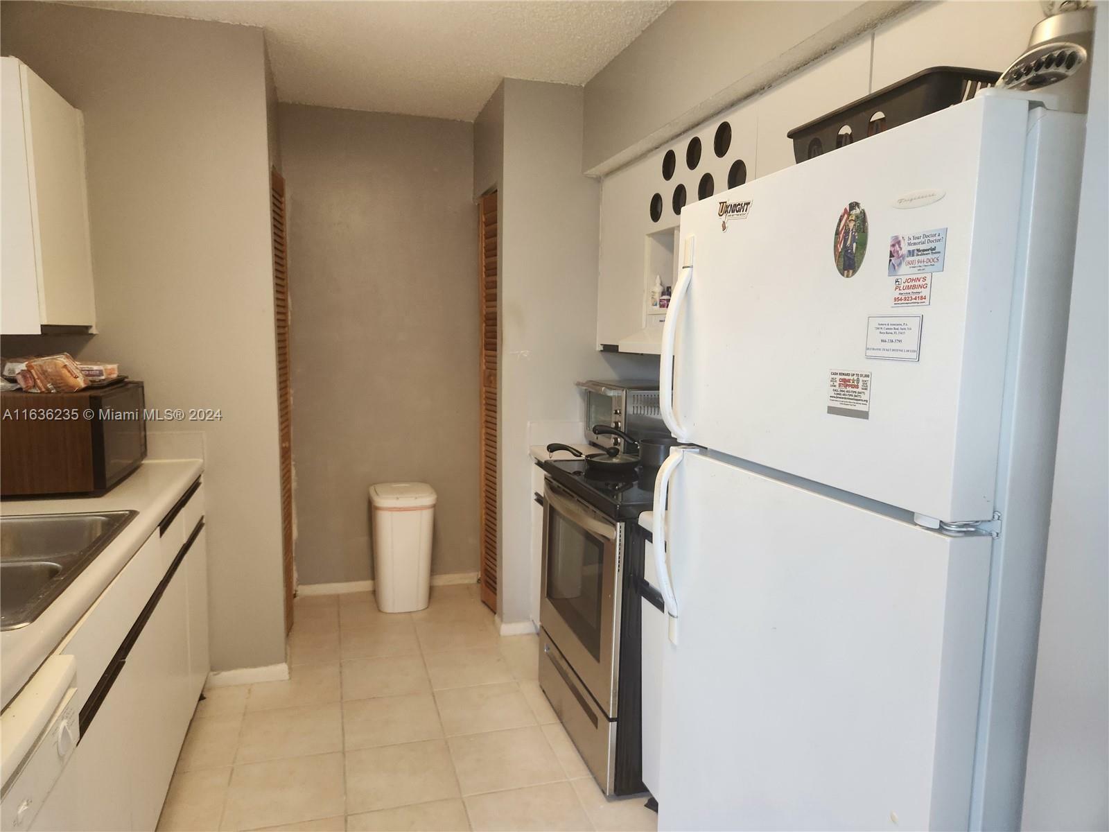 Property Photo:  8657 SW 5th St 208  FL 33025 