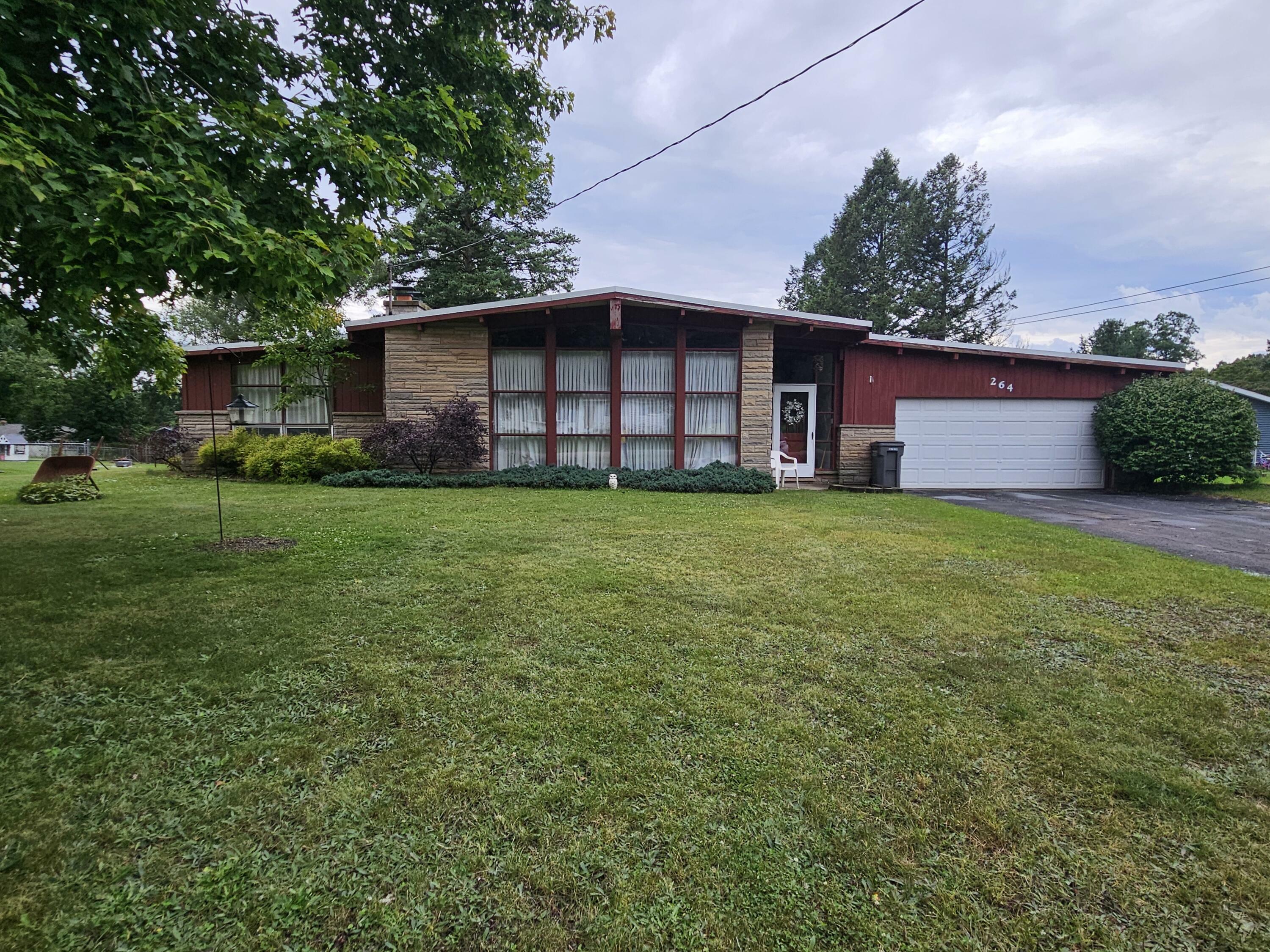 Property Photo:  264 Thelma Drive Drive  MI 49014 