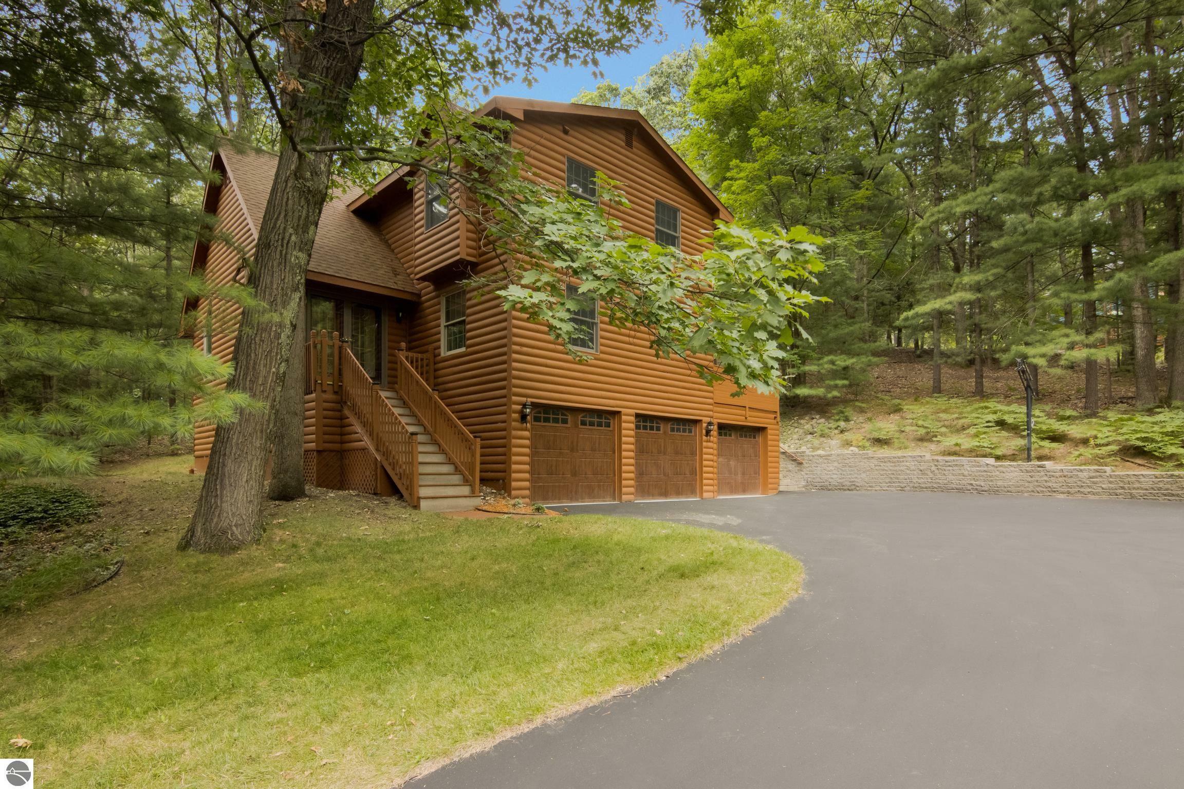 Property Photo:  3670 Holiday Village Road  MI 49686 