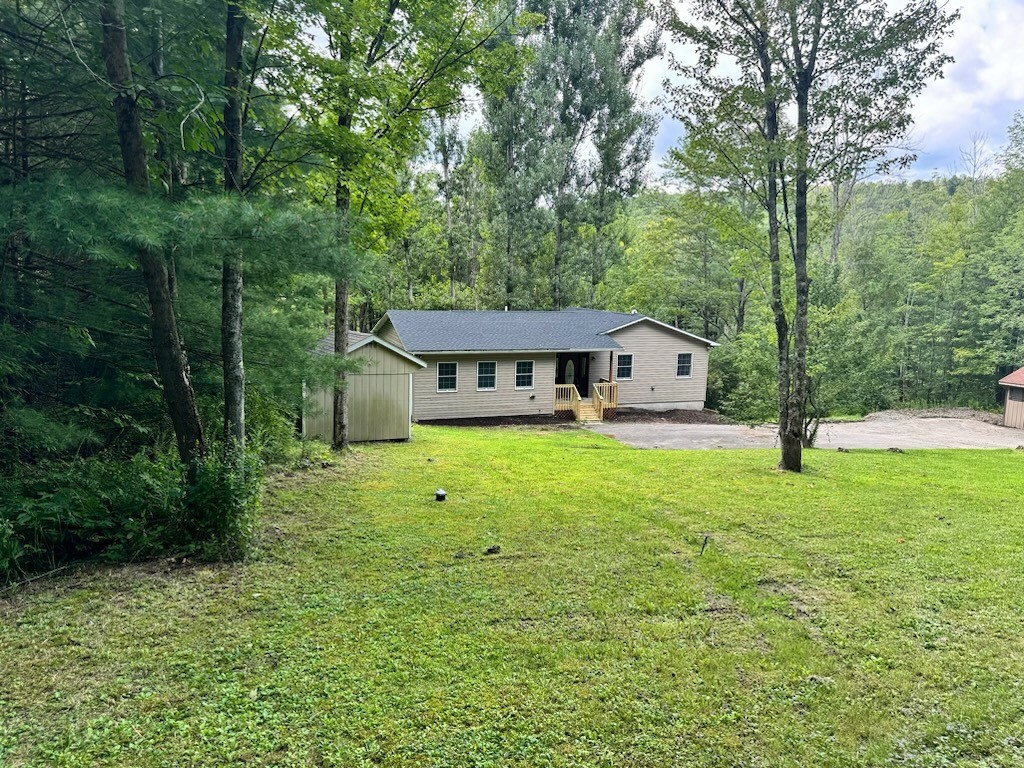 Property Photo:  203 Beaver Lake Circle  NY 13865 