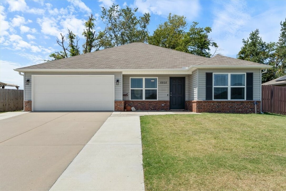 Property Photo:  6605 NW Orchard Street  AR 72713 