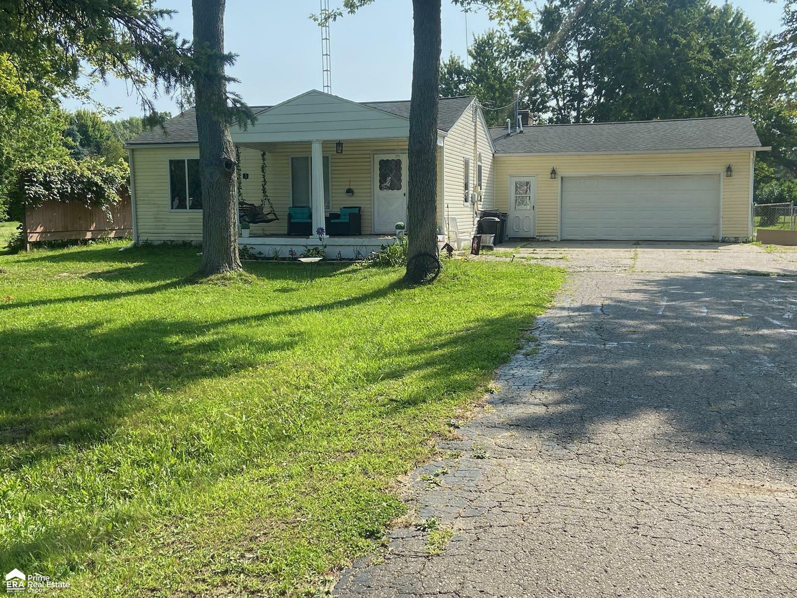 Property Photo:  6228 N Linden Road  MI 48458 