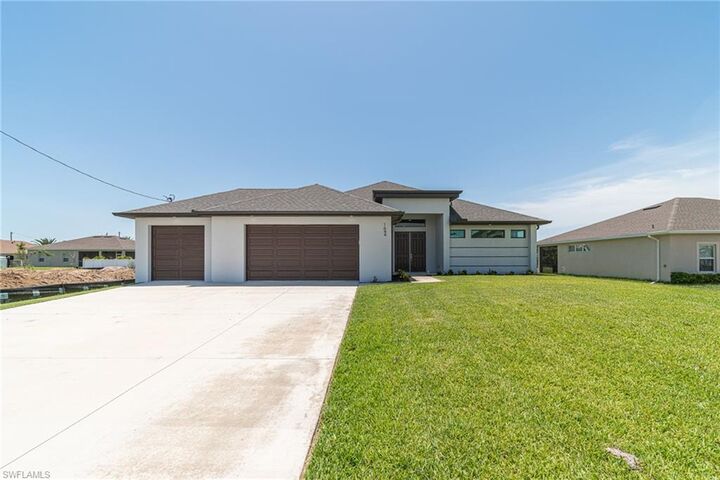 Property Photo:  1644 NW 37th Ave  FL 33993 