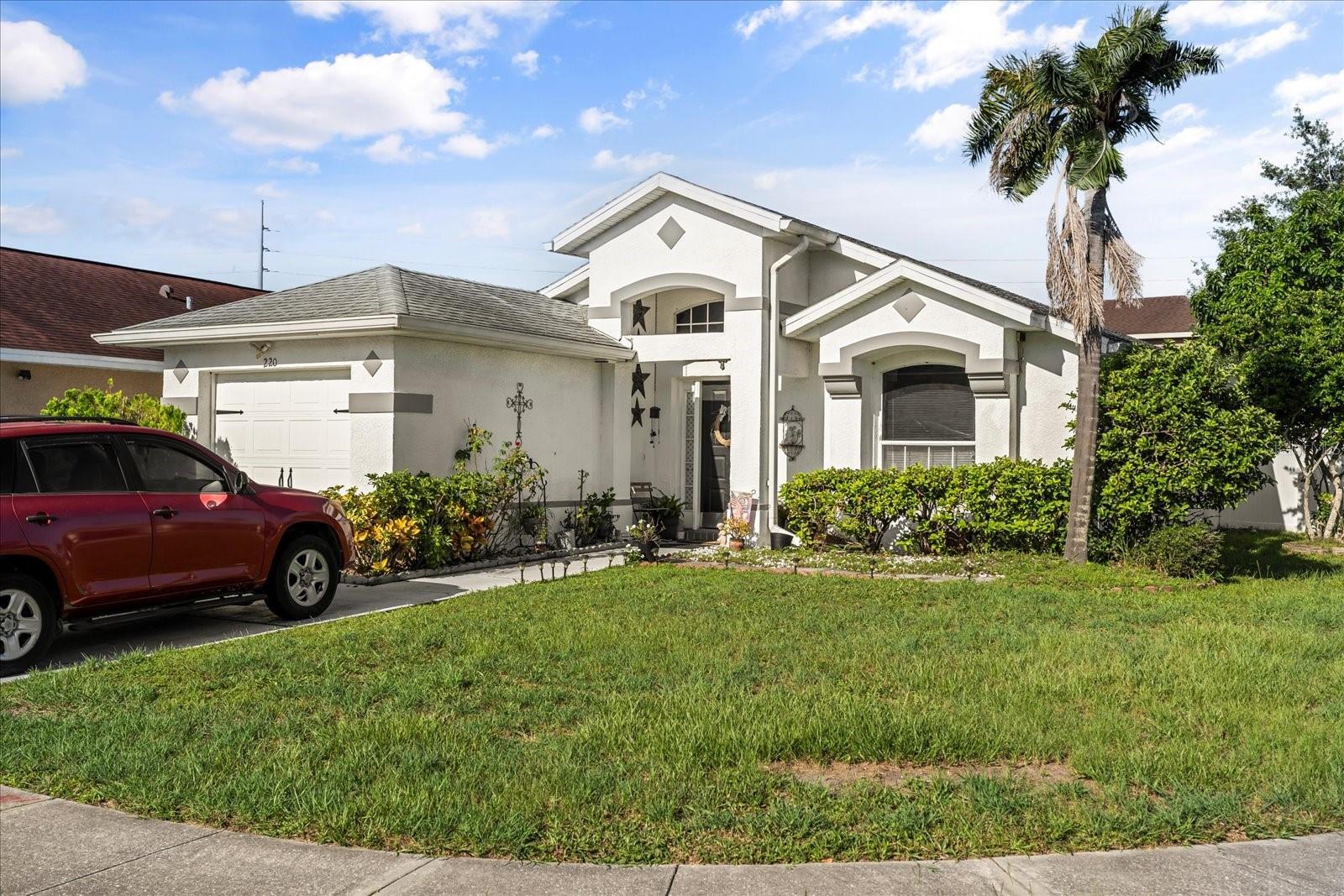 Property Photo: 220 Coralwood Court FL 34743
